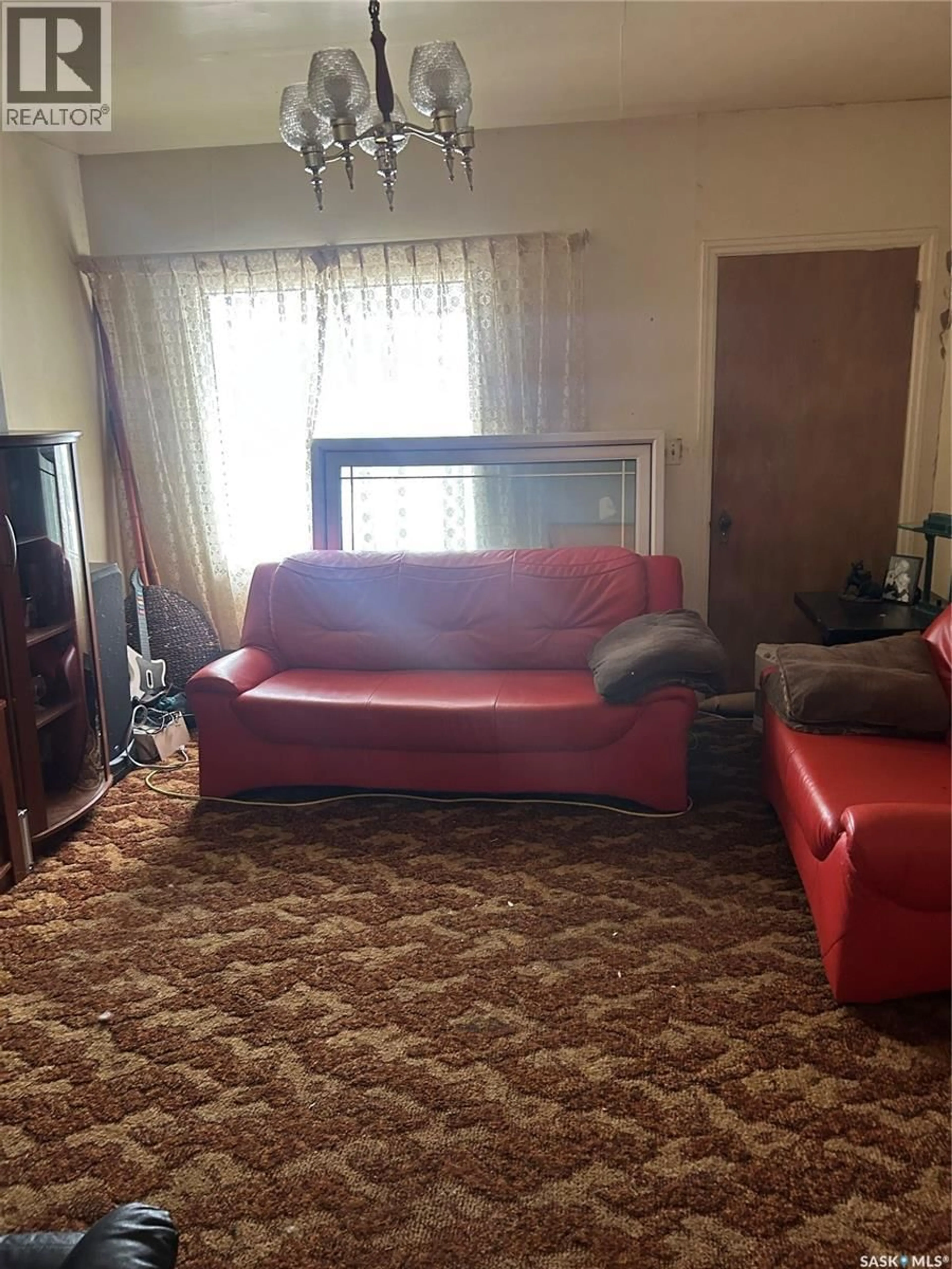 Living room with furniture, carpet floor for 550 2ND AVENUE, Canwood Saskatchewan S0J0K0