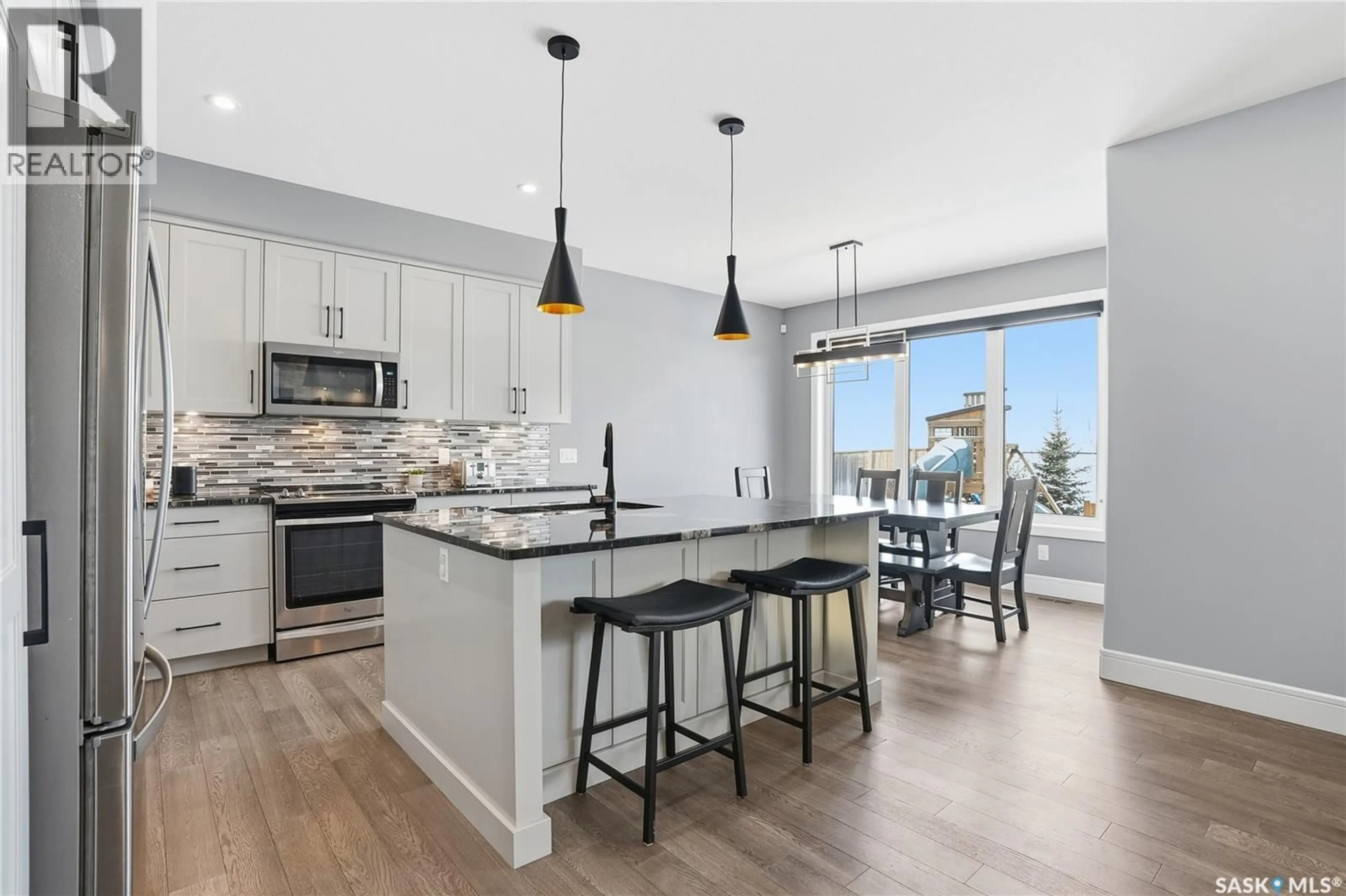 Open concept kitchen, ceramic/tile floor for 359 MAHABIR COURT, Saskatoon Saskatchewan S7W0J5