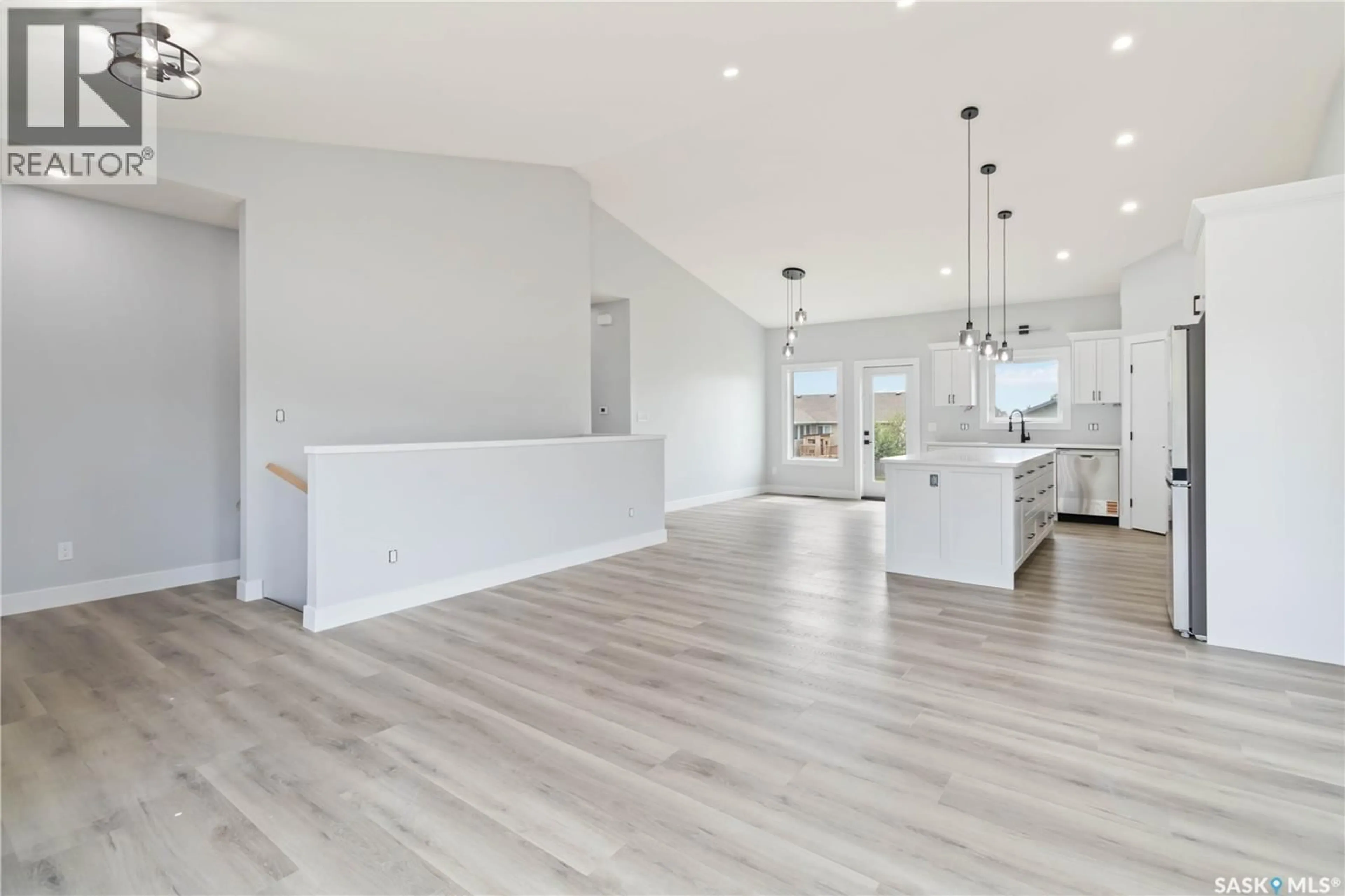 Open concept kitchen, wood/laminate floor for 208 2ND STREET, Waldheim Saskatchewan S0K4R0