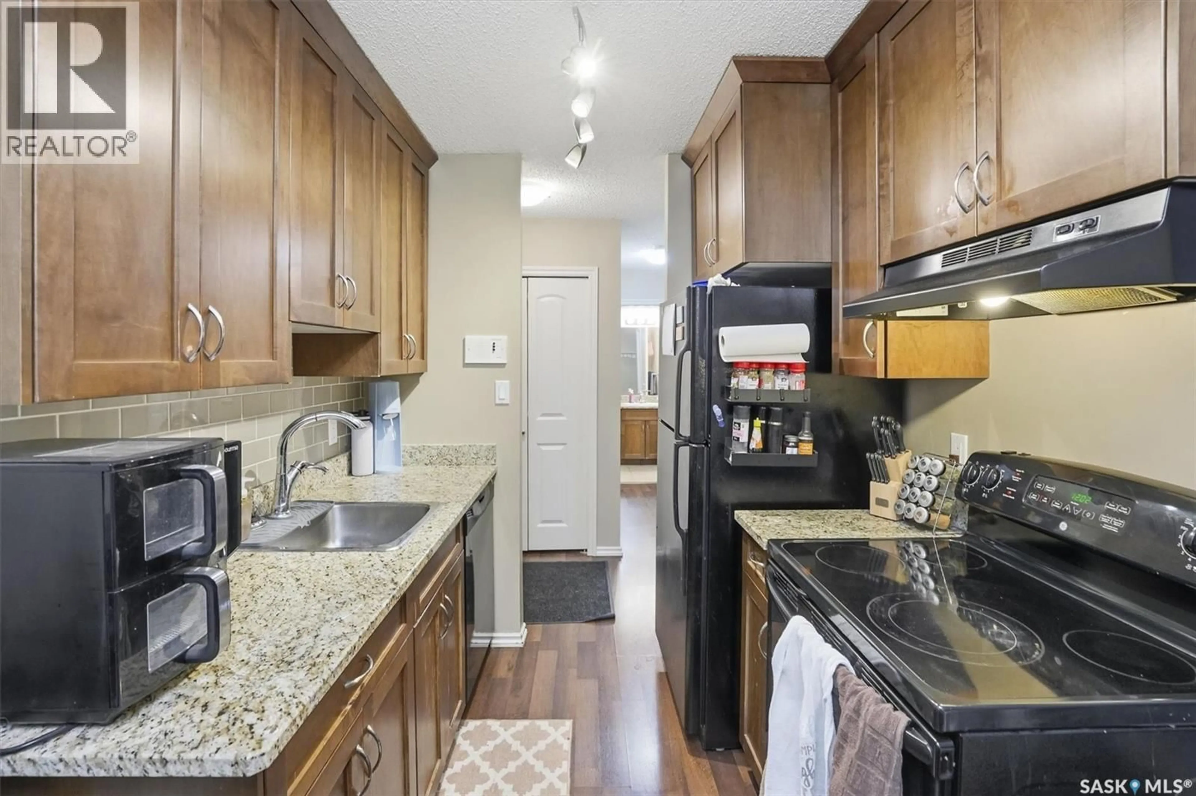 Standard kitchen, ceramic/tile floor for 205 250 PINEHOUSE PLACE, Saskatoon Saskatchewan S7K4X1