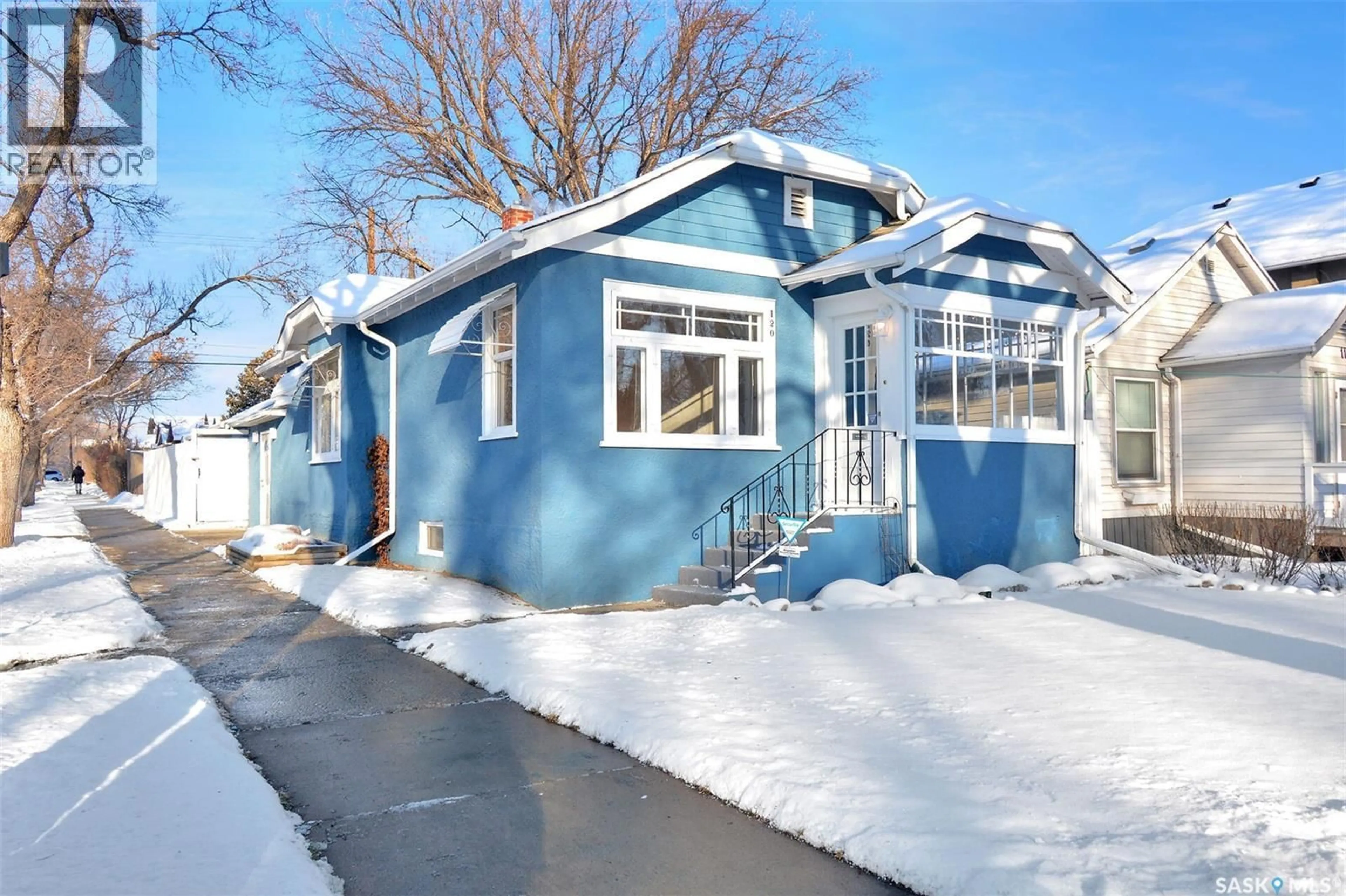Home with vinyl exterior material, street for 120 32ND STREET, Saskatoon Saskatchewan S7L0S1