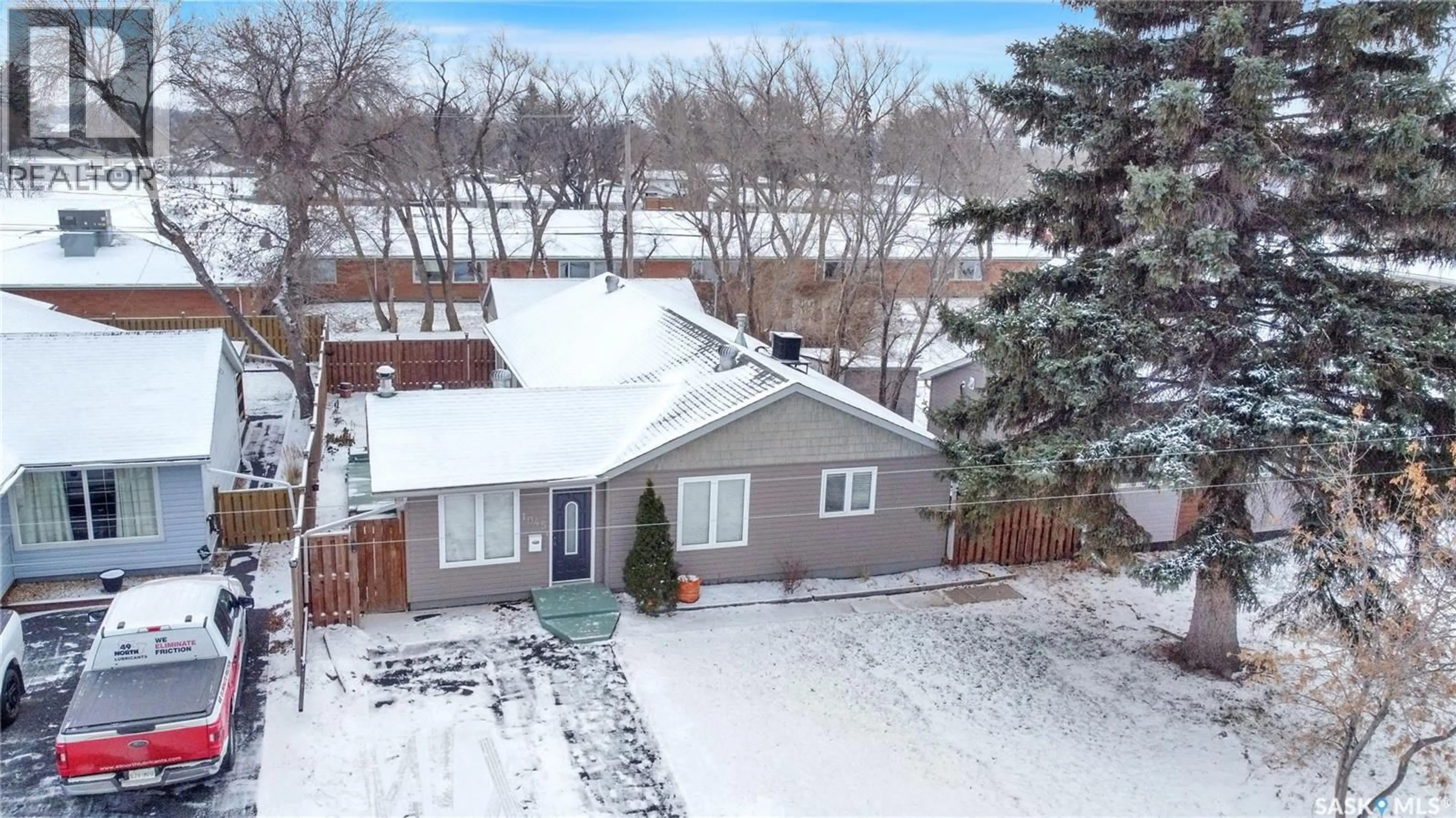 A pic from outside/outdoor area/front of a property/back of a property/a pic from drone, street for 1045 BROWN STREET, Moose Jaw Saskatchewan S6H2Z4