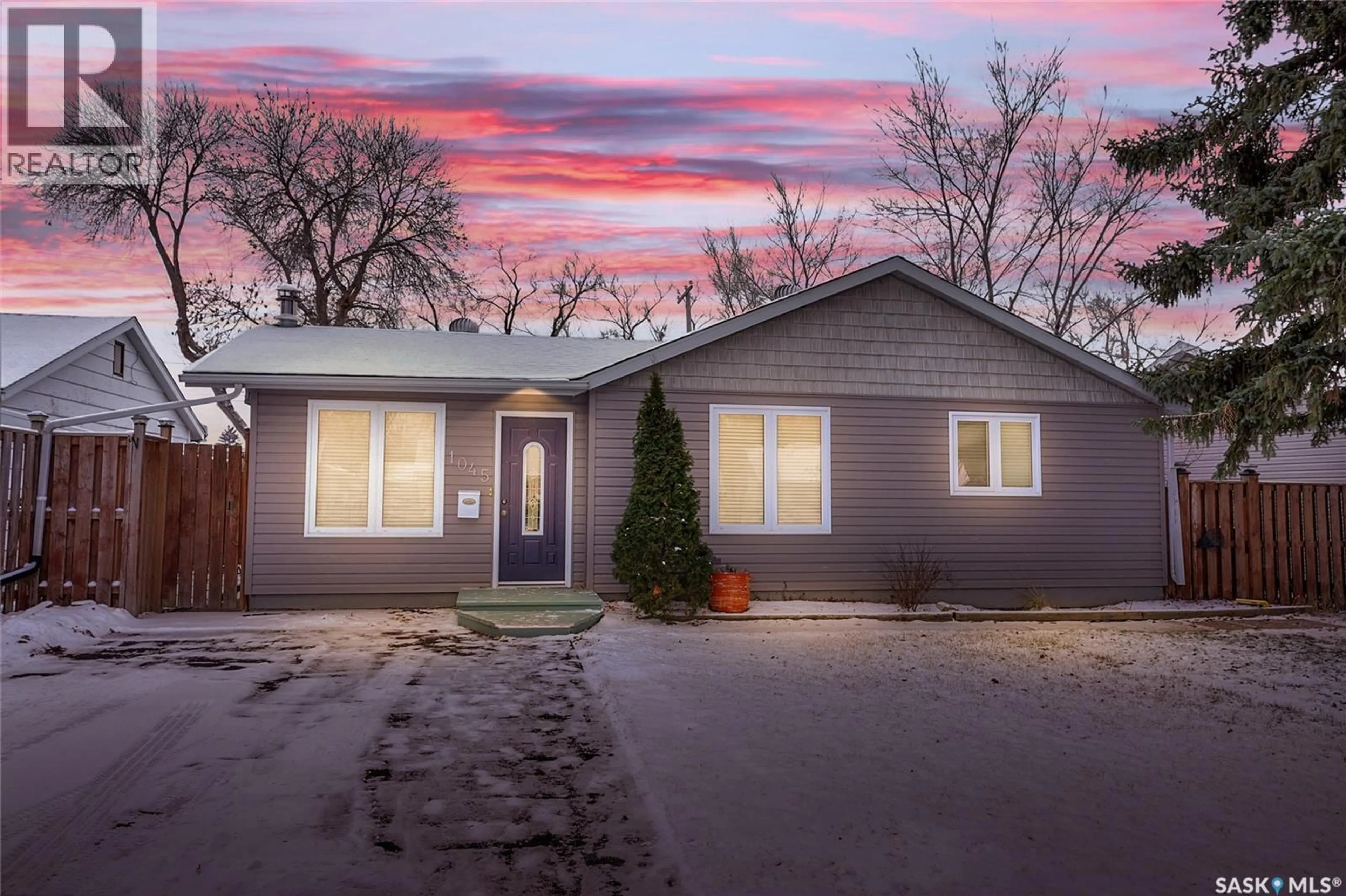 Home with vinyl exterior material, street for 1045 BROWN STREET, Moose Jaw Saskatchewan S6H2Z4