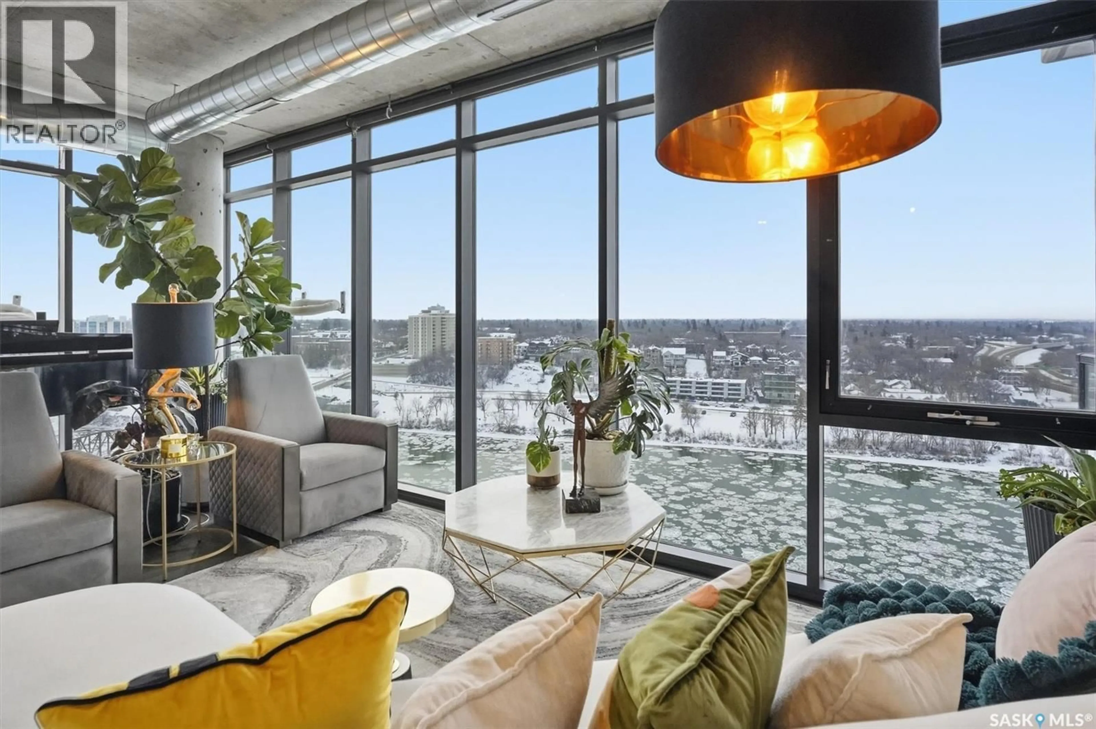 Living room with furniture, cement floor for 490 - 1505 2ND AVENUE, Saskatoon Saskatchewan S7K4H5