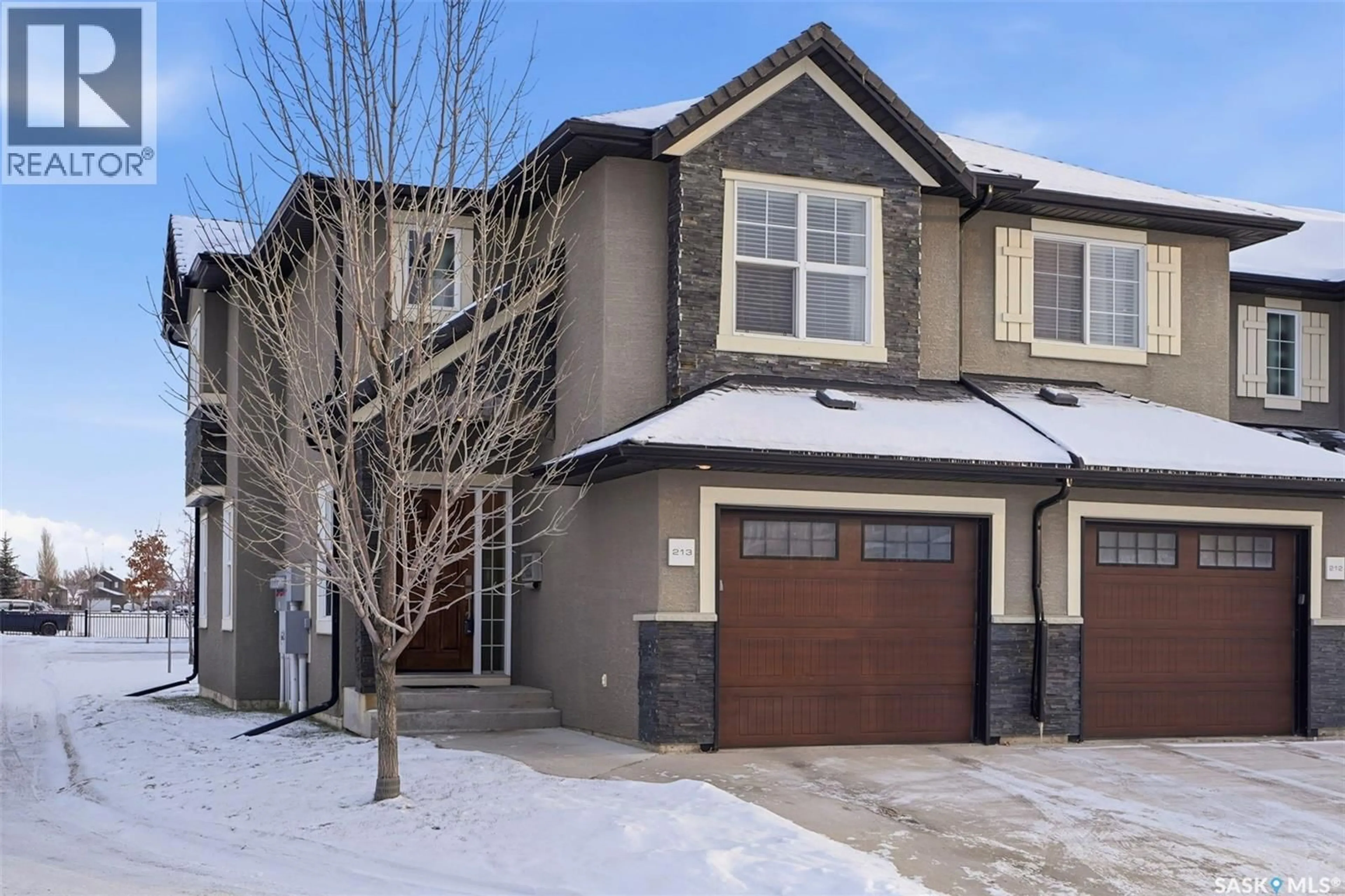 Home with brick exterior material, street for 213 455 REMPEL LANE, Saskatoon Saskatchewan S7T0R9