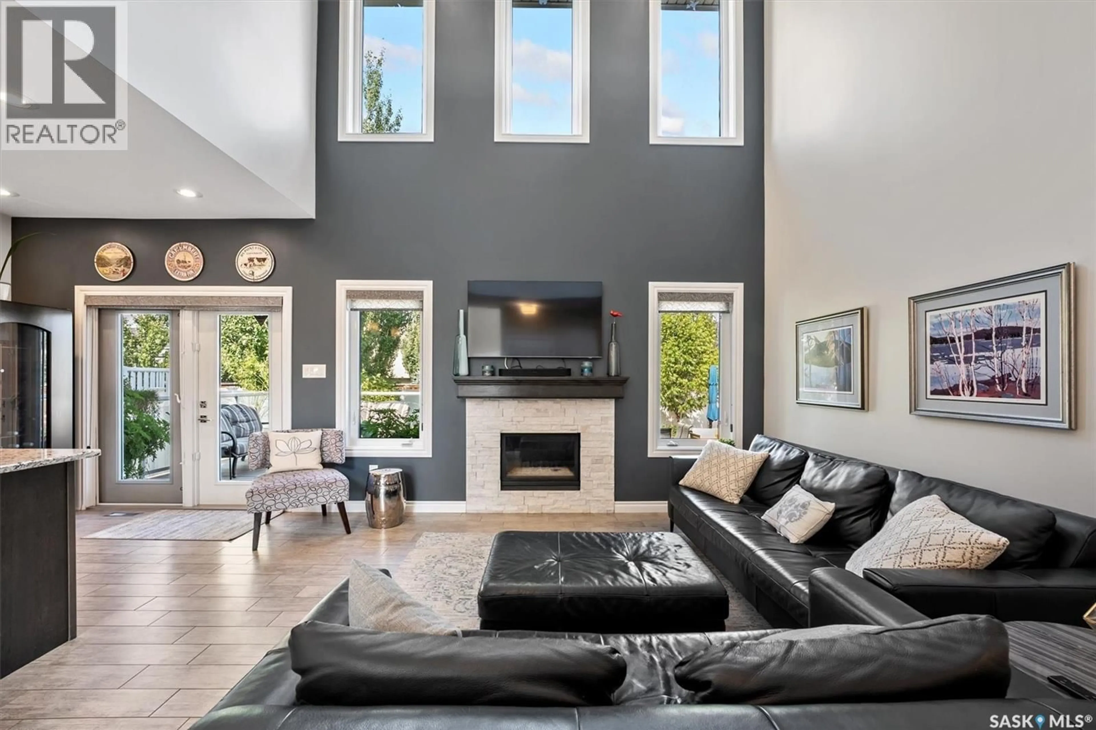 Living room with furniture, unknown for 210 CLUBHOUSE BOULEVARD, Warman Saskatchewan S0K4S1