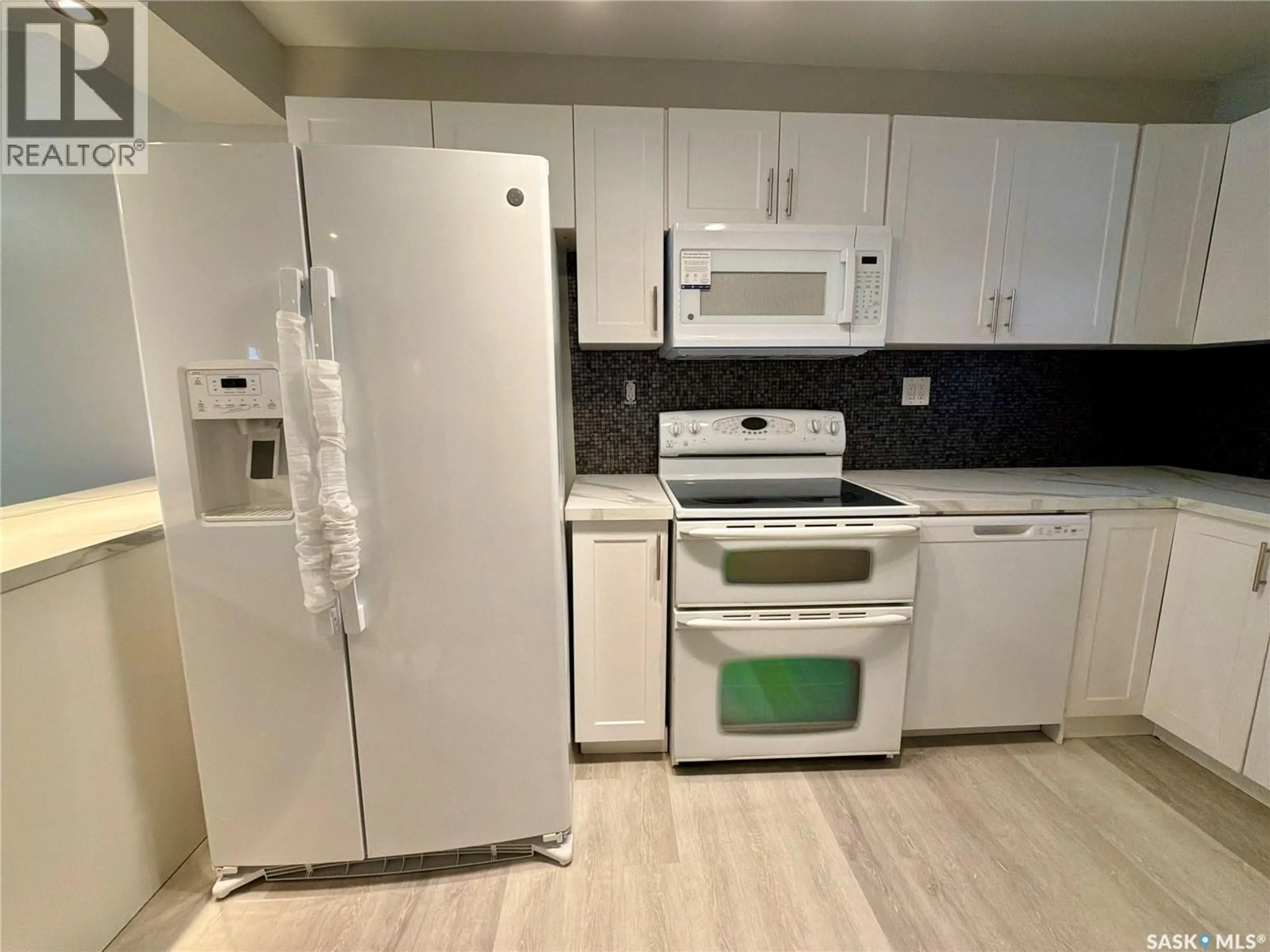Standard kitchen, wood/laminate floor for 5120 DEWDNEY AVENUE, Regina Saskatchewan S4T1C1
