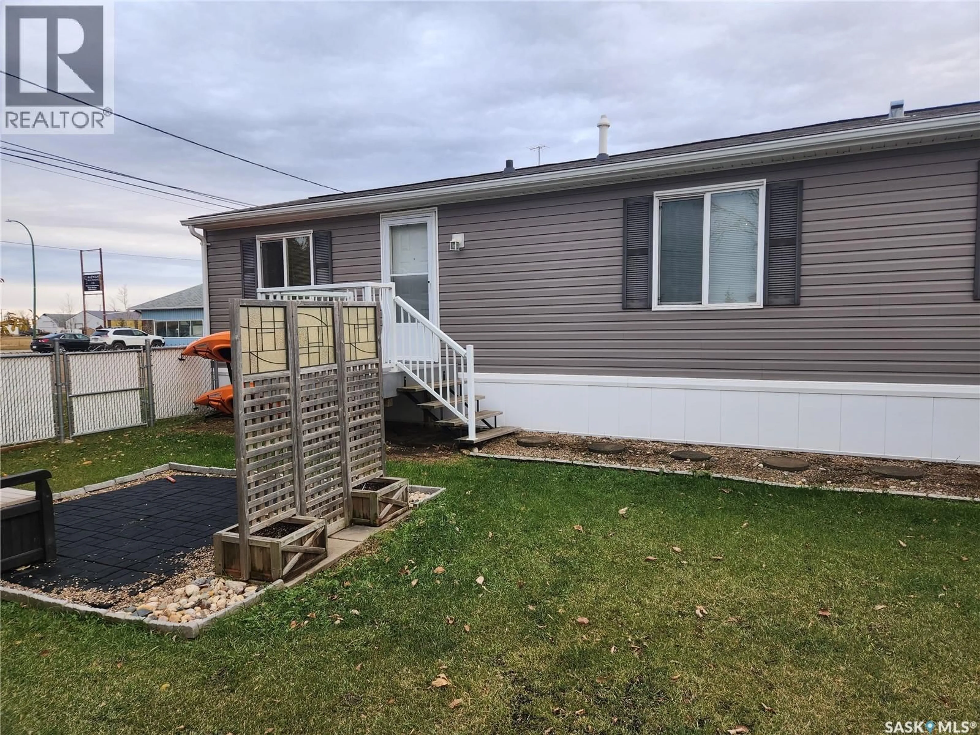 Home with vinyl exterior material, unknown for 2118 100B STREET, Tisdale Saskatchewan S0E1T0