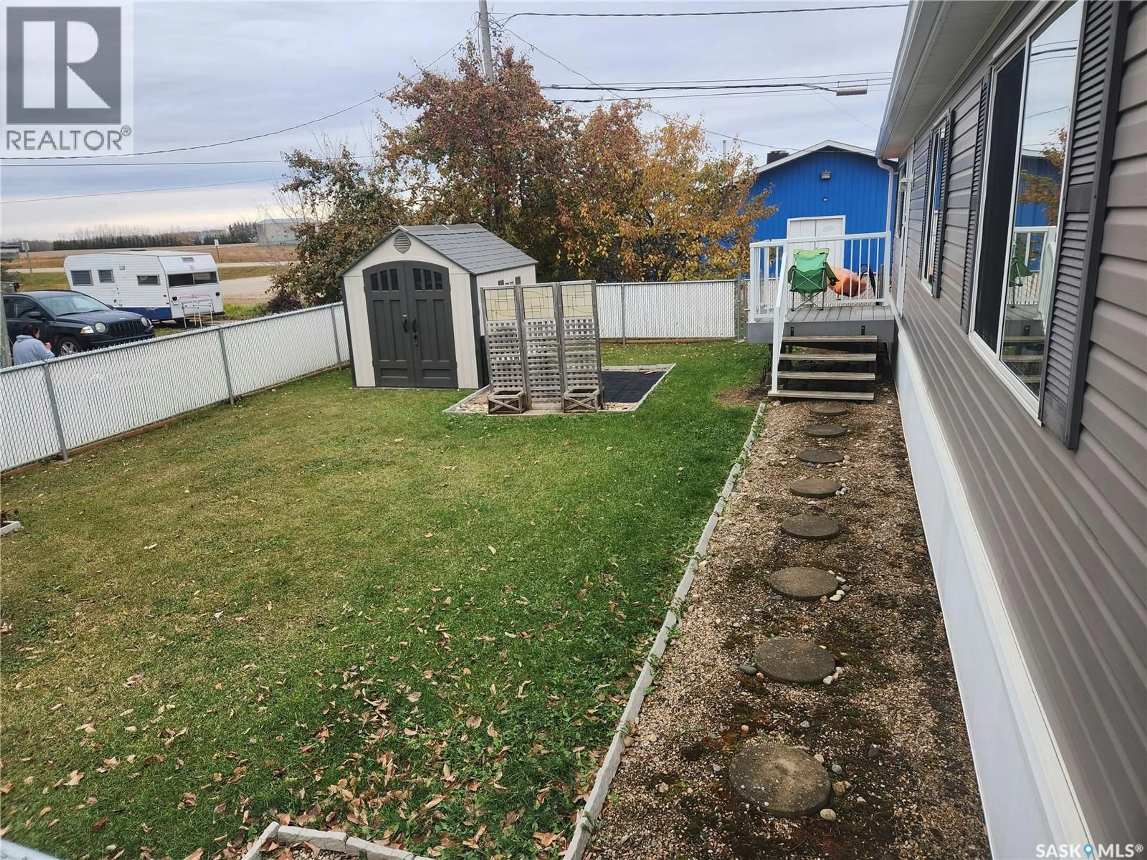 A pic from outside/outdoor area/front of a property/back of a property/a pic from drone, street for 2118 100B STREET, Tisdale Saskatchewan S0E1T0