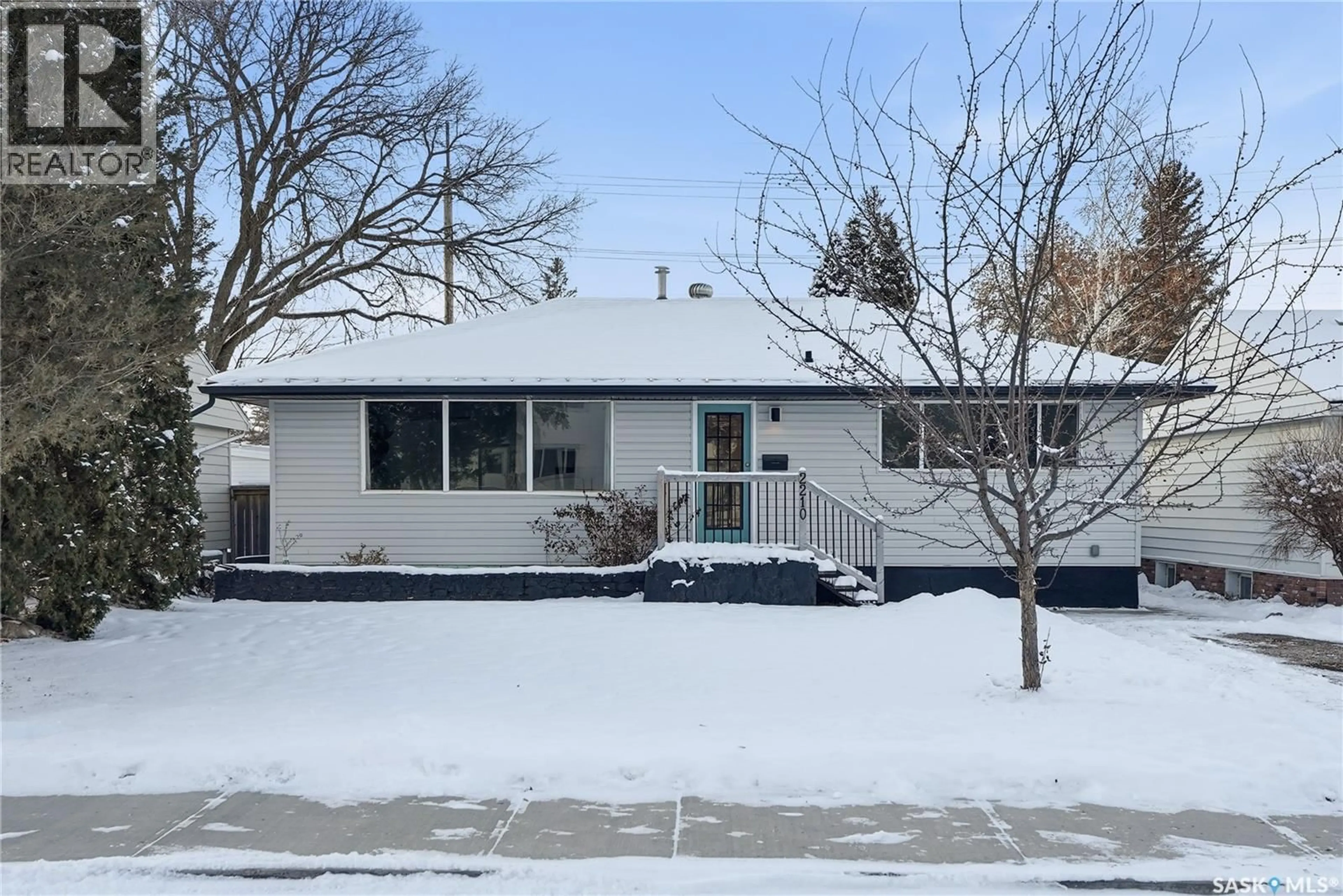 Home with vinyl exterior material, street for 2210 WILLIAM AVENUE, Saskatoon Saskatchewan S7J1A6