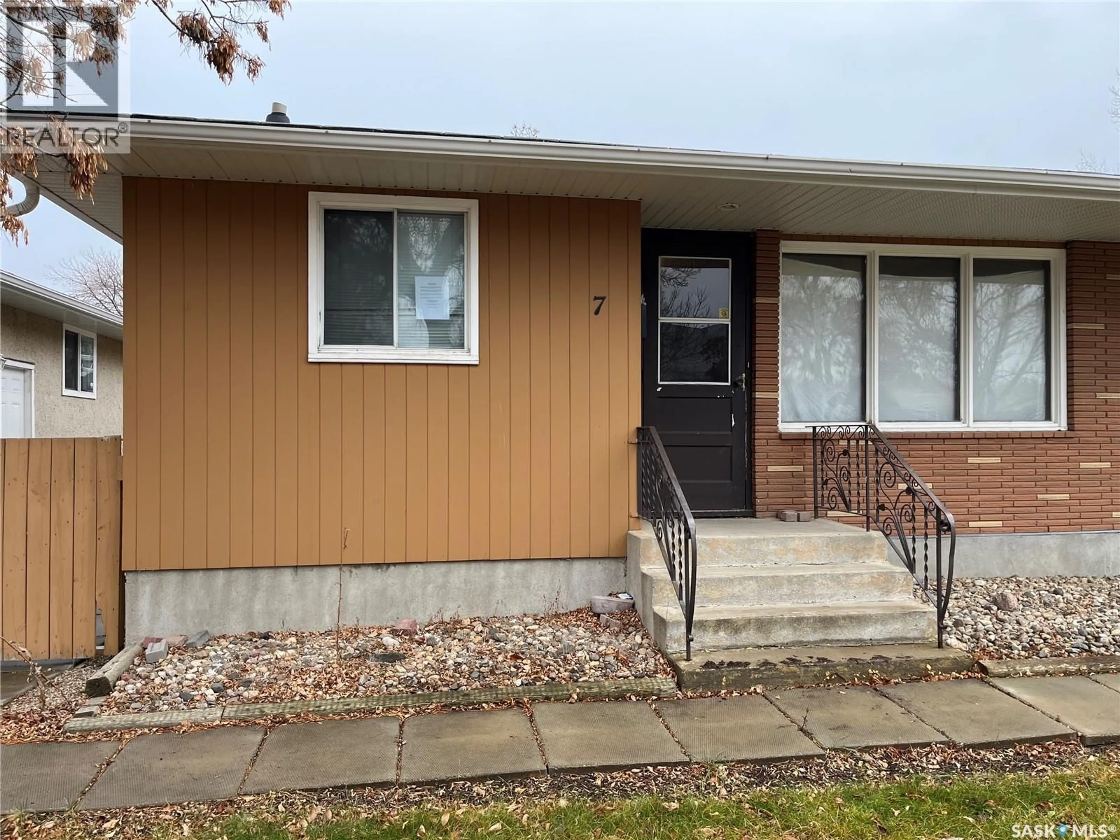 Home with vinyl exterior material, street for 7 MCMURCHY AVENUE, Regina Saskatchewan S4R3G1