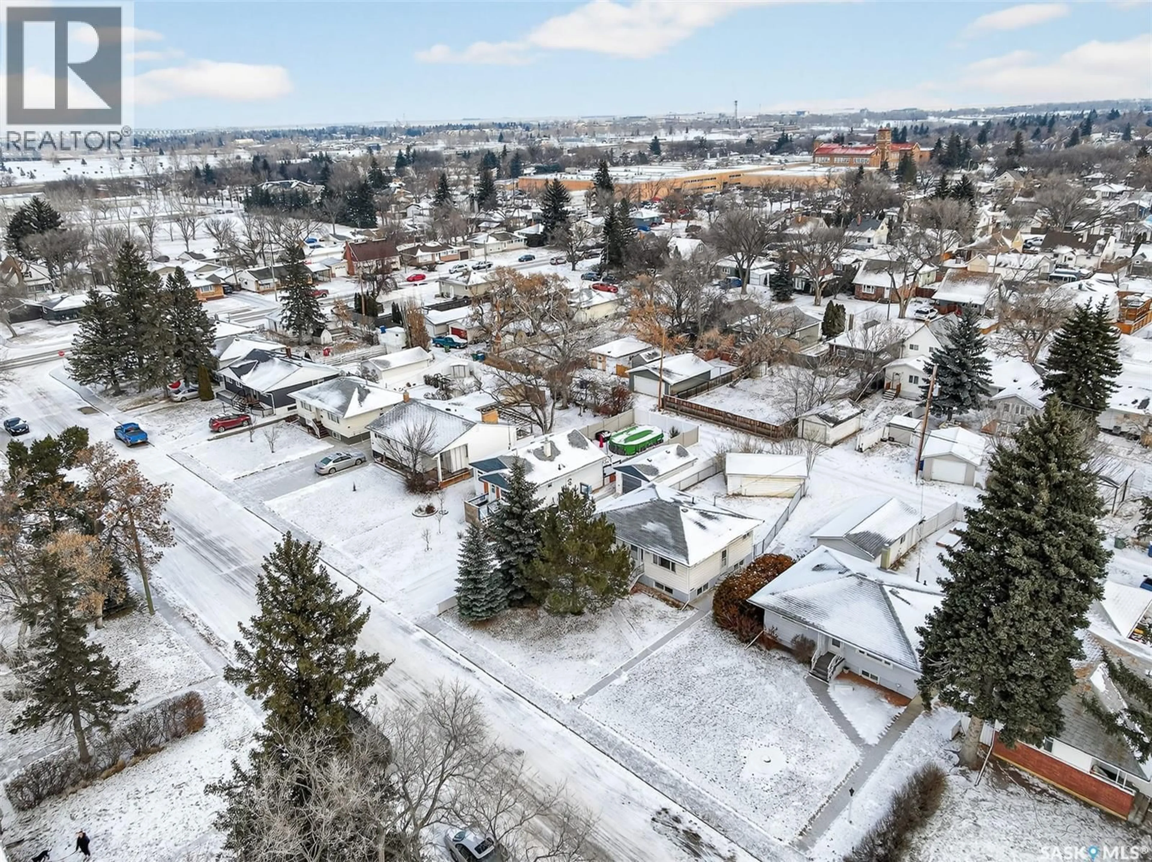 A pic from outside/outdoor area/front of a property/back of a property/a pic from drone, street for 1125 8TH AVENUE, Moose Jaw Saskatchewan S6H4G4