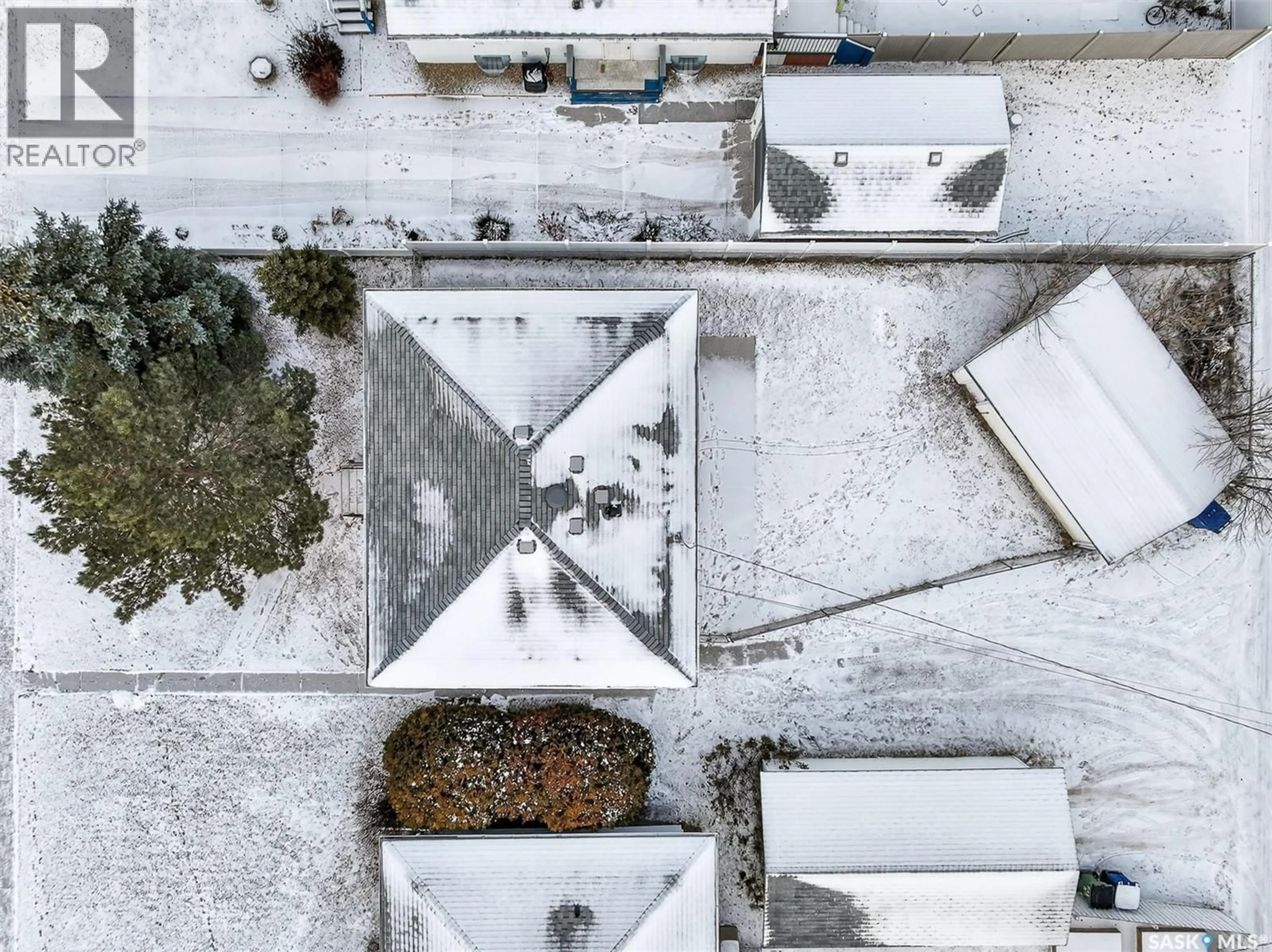 A pic from outside/outdoor area/front of a property/back of a property/a pic from drone, street for 1125 8TH AVENUE, Moose Jaw Saskatchewan S6H4G4