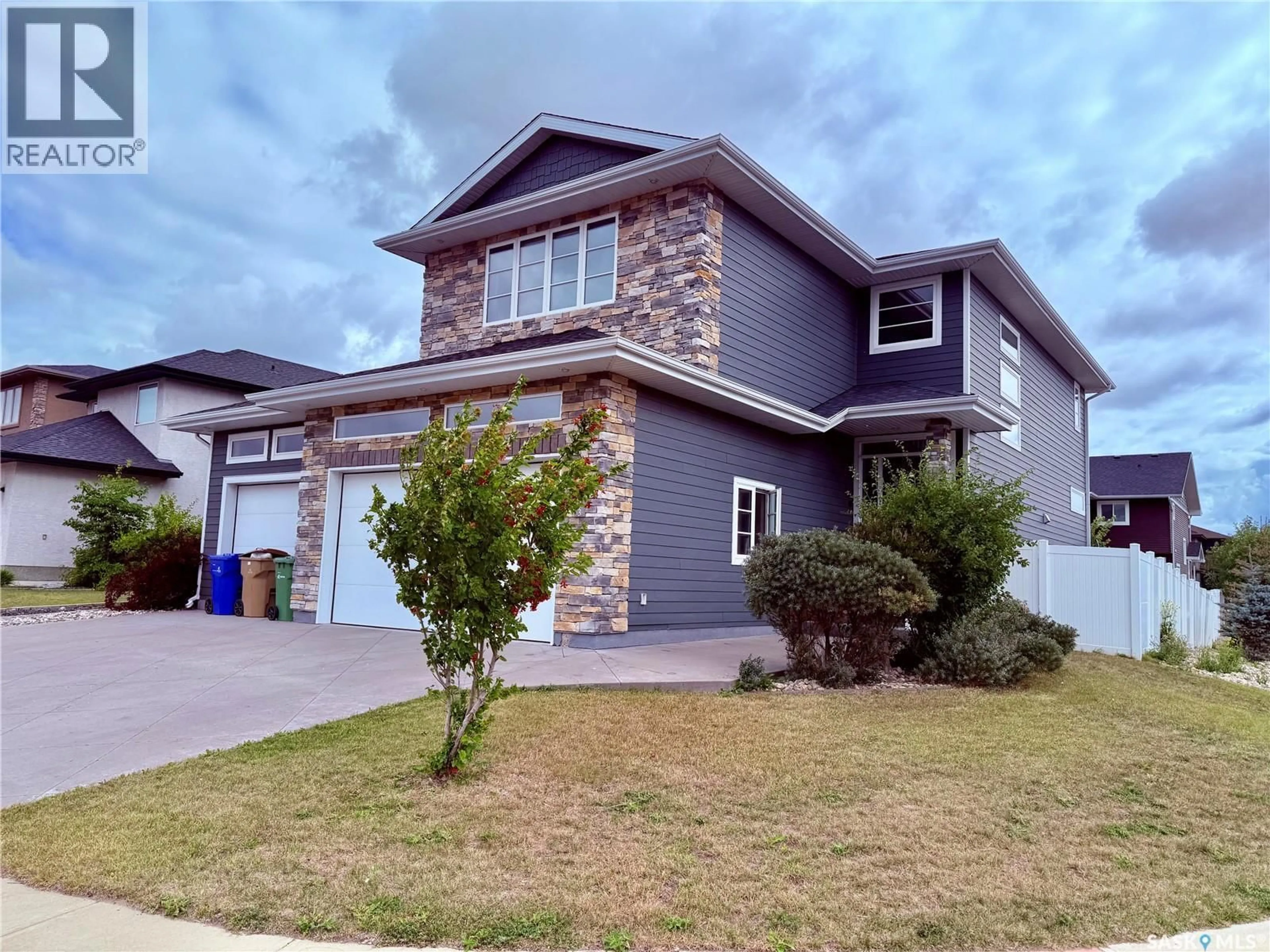 Home with vinyl exterior material, street for 3633 GREEN WATER DRIVE, Regina Saskatchewan S4V1R3