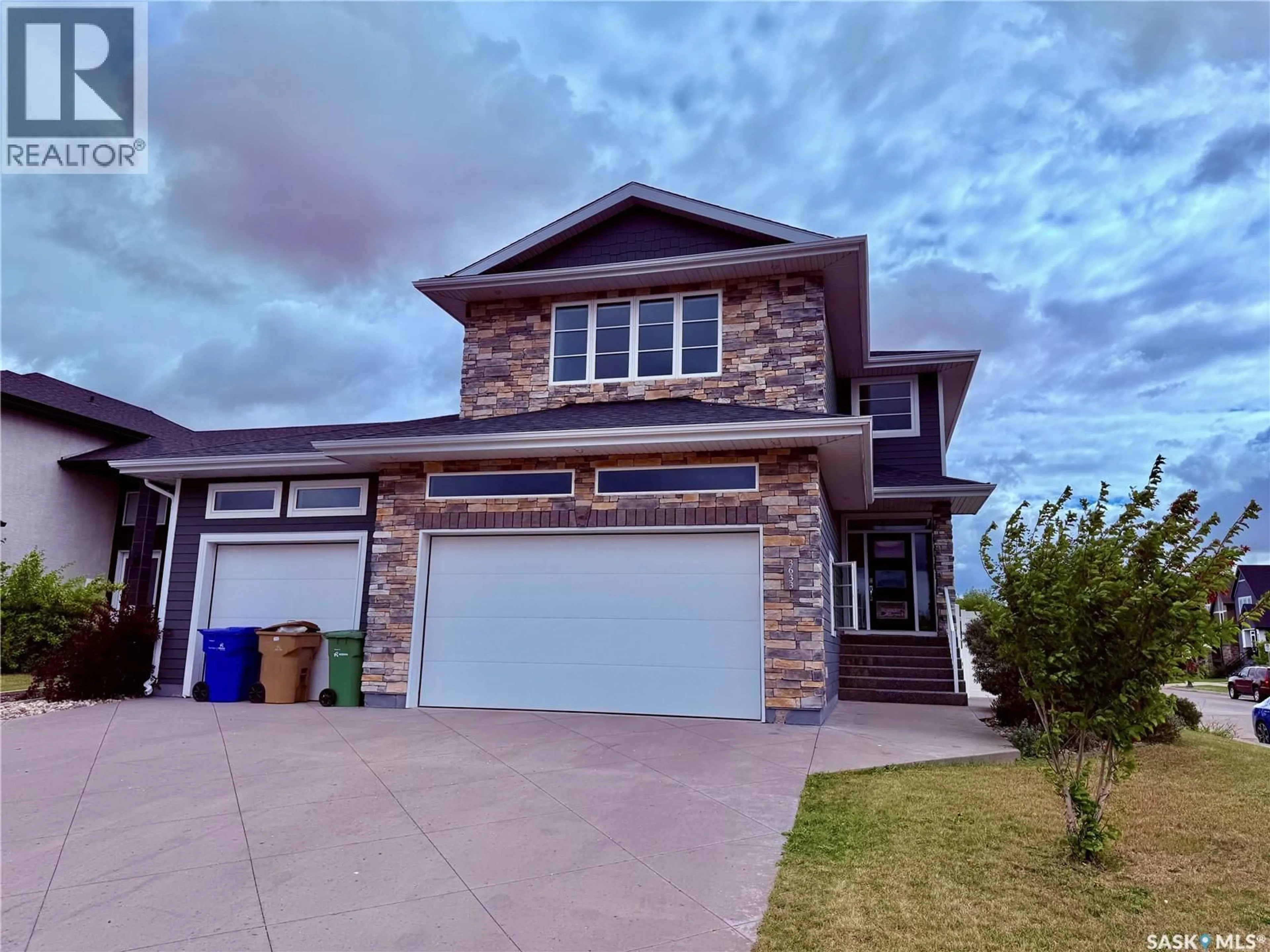 Home with vinyl exterior material, street for 3633 GREEN WATER DRIVE, Regina Saskatchewan S4V1R3