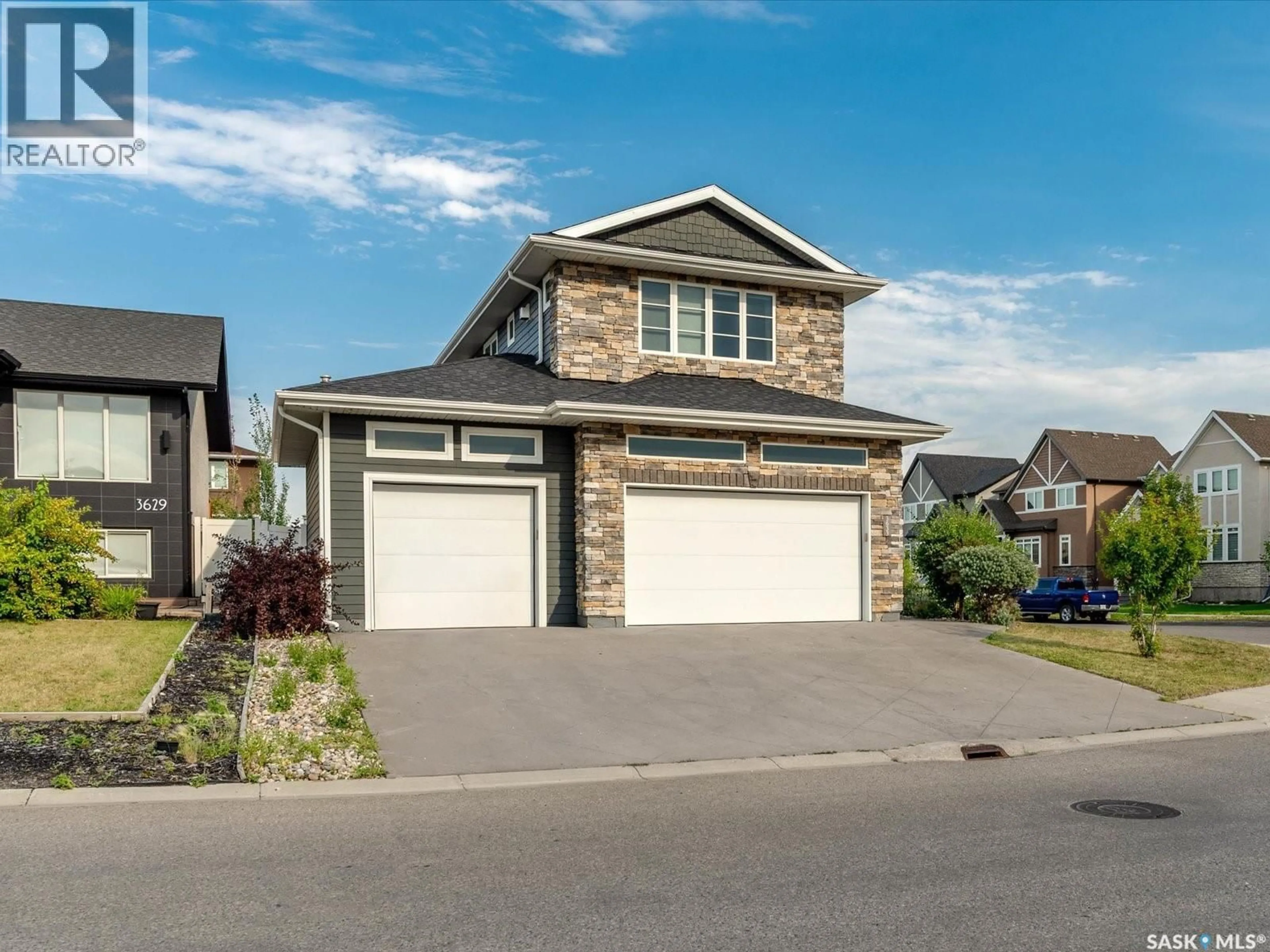 Home with vinyl exterior material, street for 3633 GREEN WATER DRIVE, Regina Saskatchewan S4V1R3