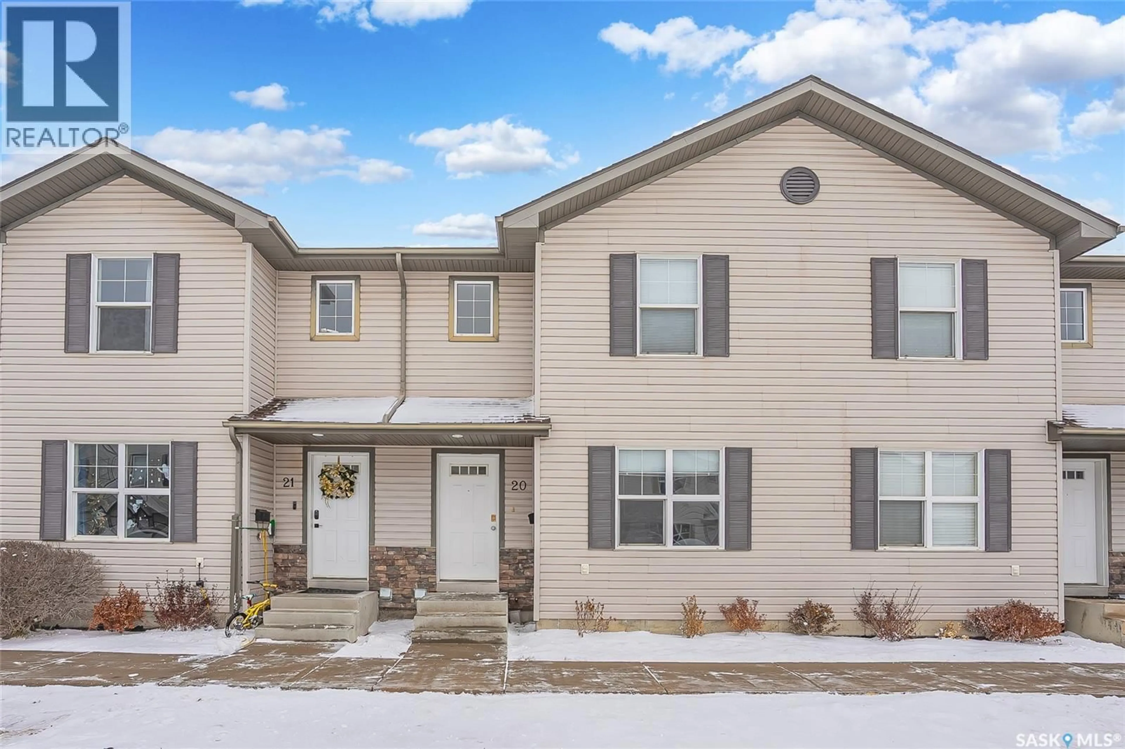 Home with vinyl exterior material, street for 135 - 20 PAWLYCHENKO LANE, Saskatoon Saskatchewan S7V1J8