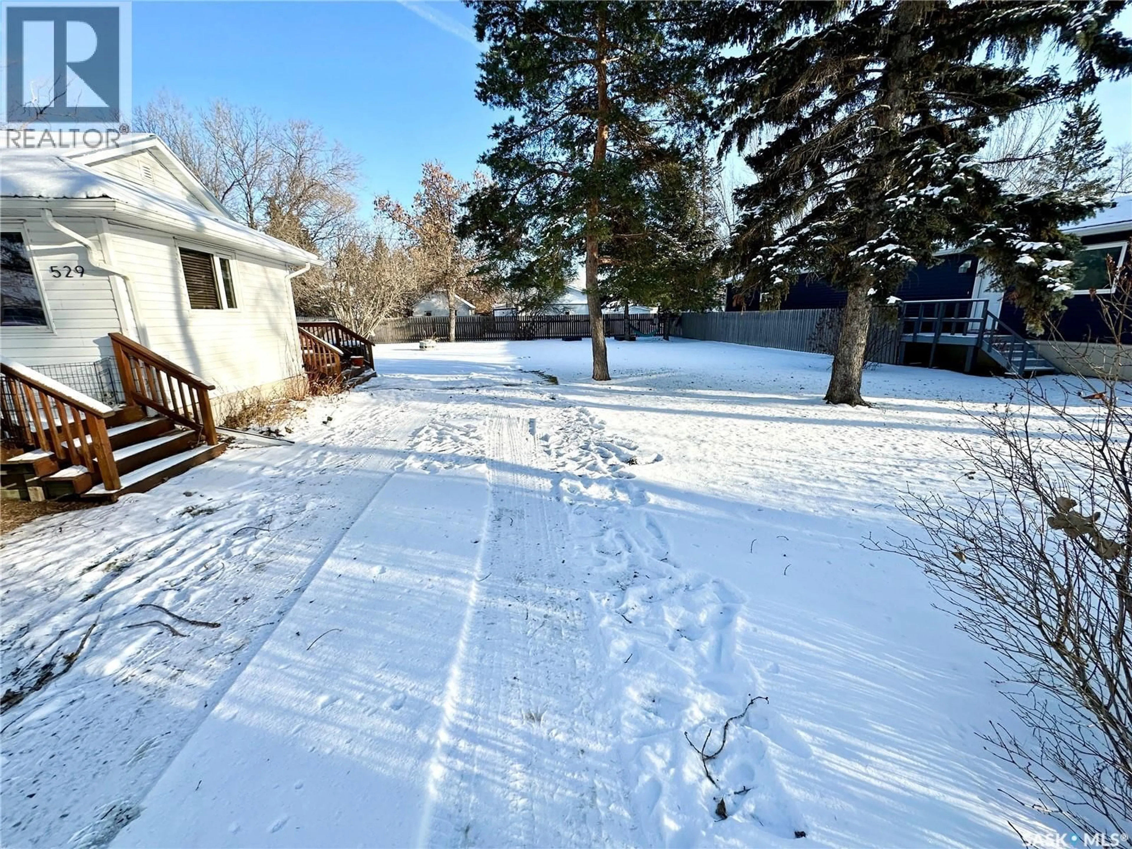 A pic from outside/outdoor area/front of a property/back of a property/a pic from drone, street for 529 MONTGOMERY STREET, Midale Saskatchewan S0C1S0