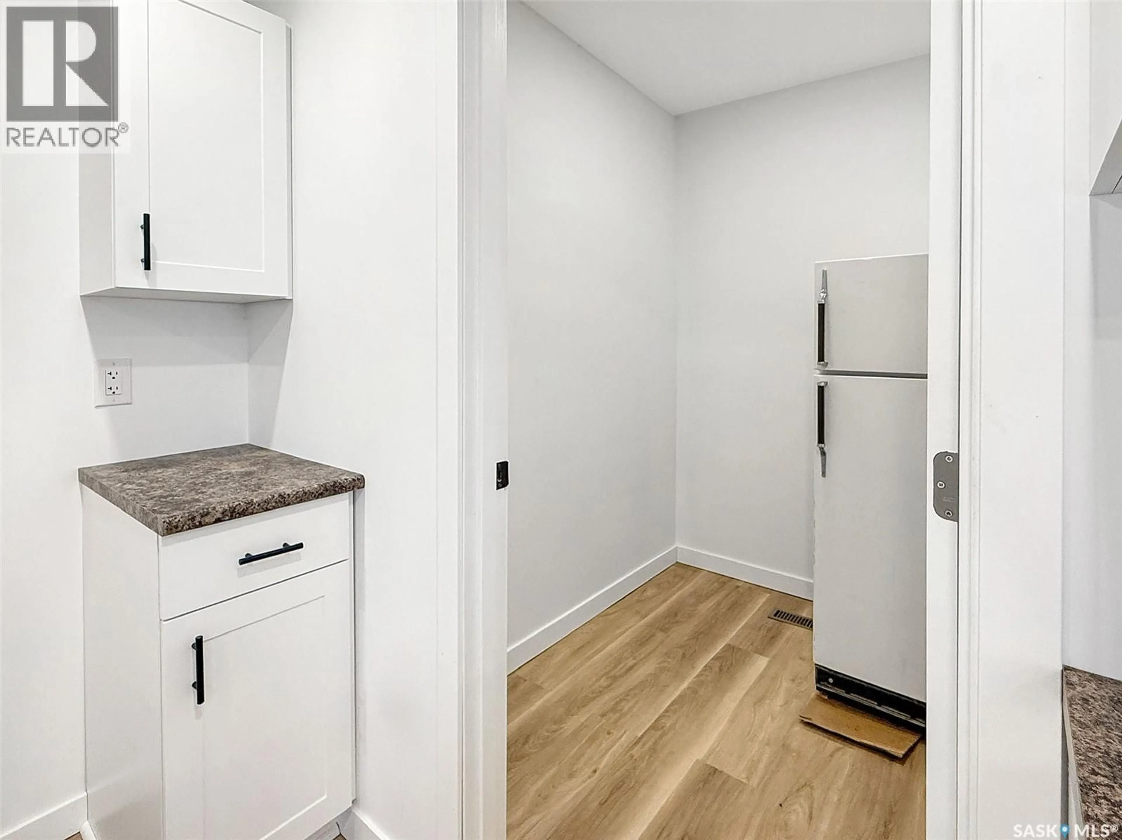 Standard kitchen, wood/laminate floor for 28 3RD AVENUE, Swift Current Saskatchewan S9H2G2