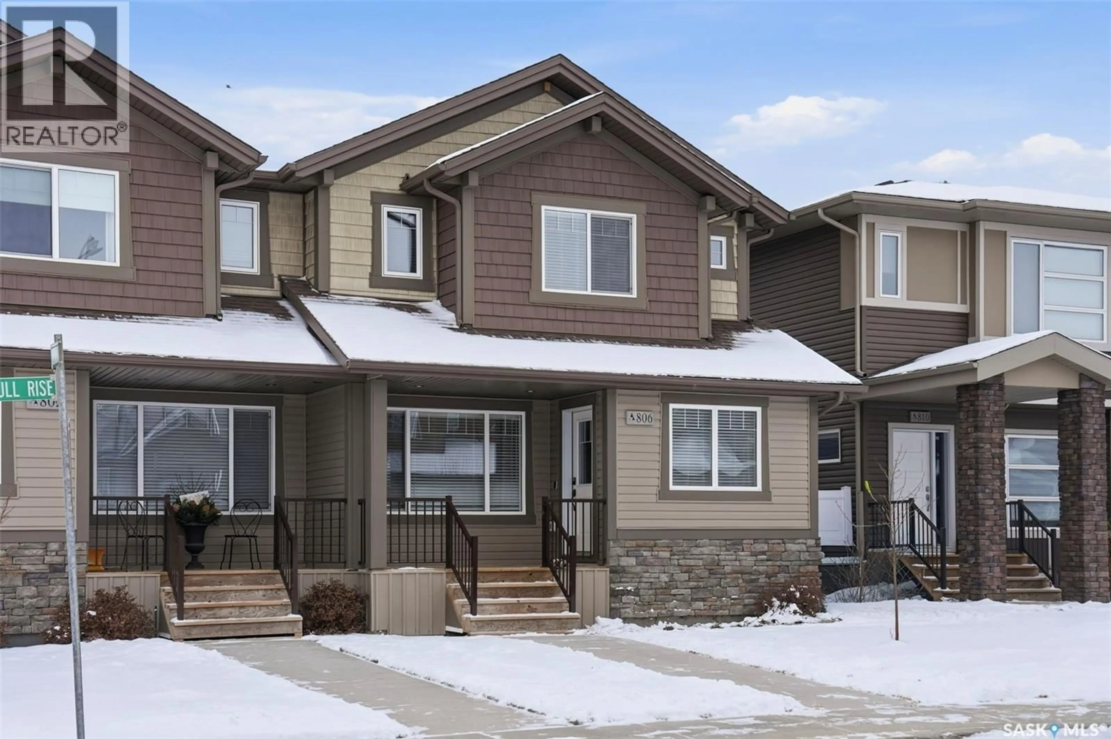 Home with vinyl exterior material, street for 806 MCFAULL RISE, Saskatoon Saskatchewan S7V0S6