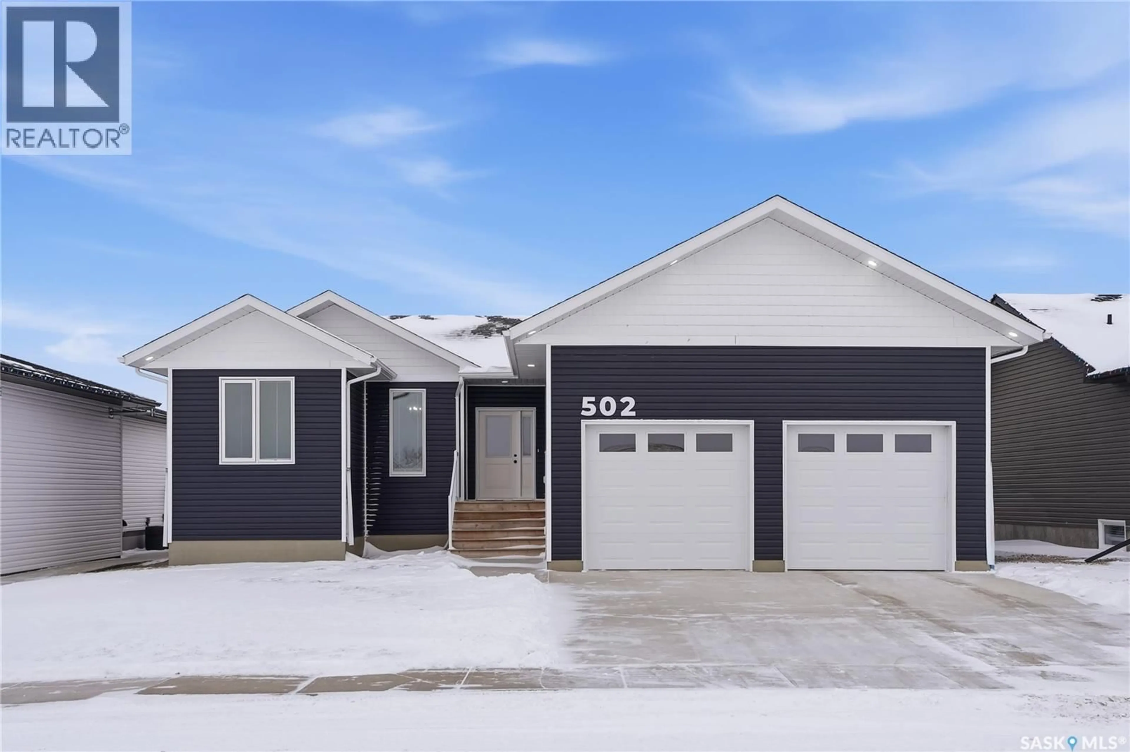 Home with vinyl exterior material, street for 502 16TH AVENUE, Humboldt Saskatchewan S0K2A0