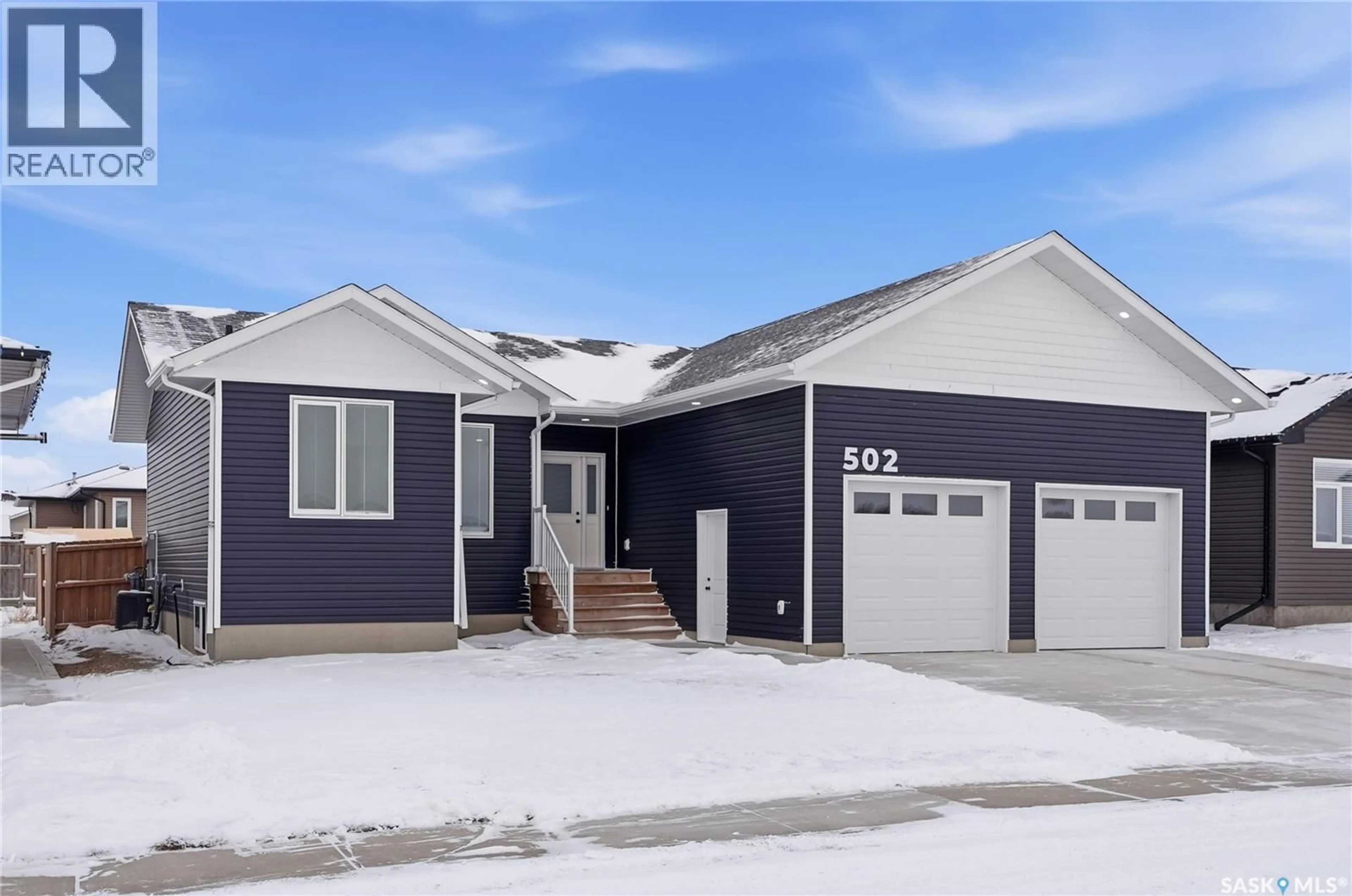 Home with vinyl exterior material, street for 502 16TH AVENUE, Humboldt Saskatchewan S0K2A0