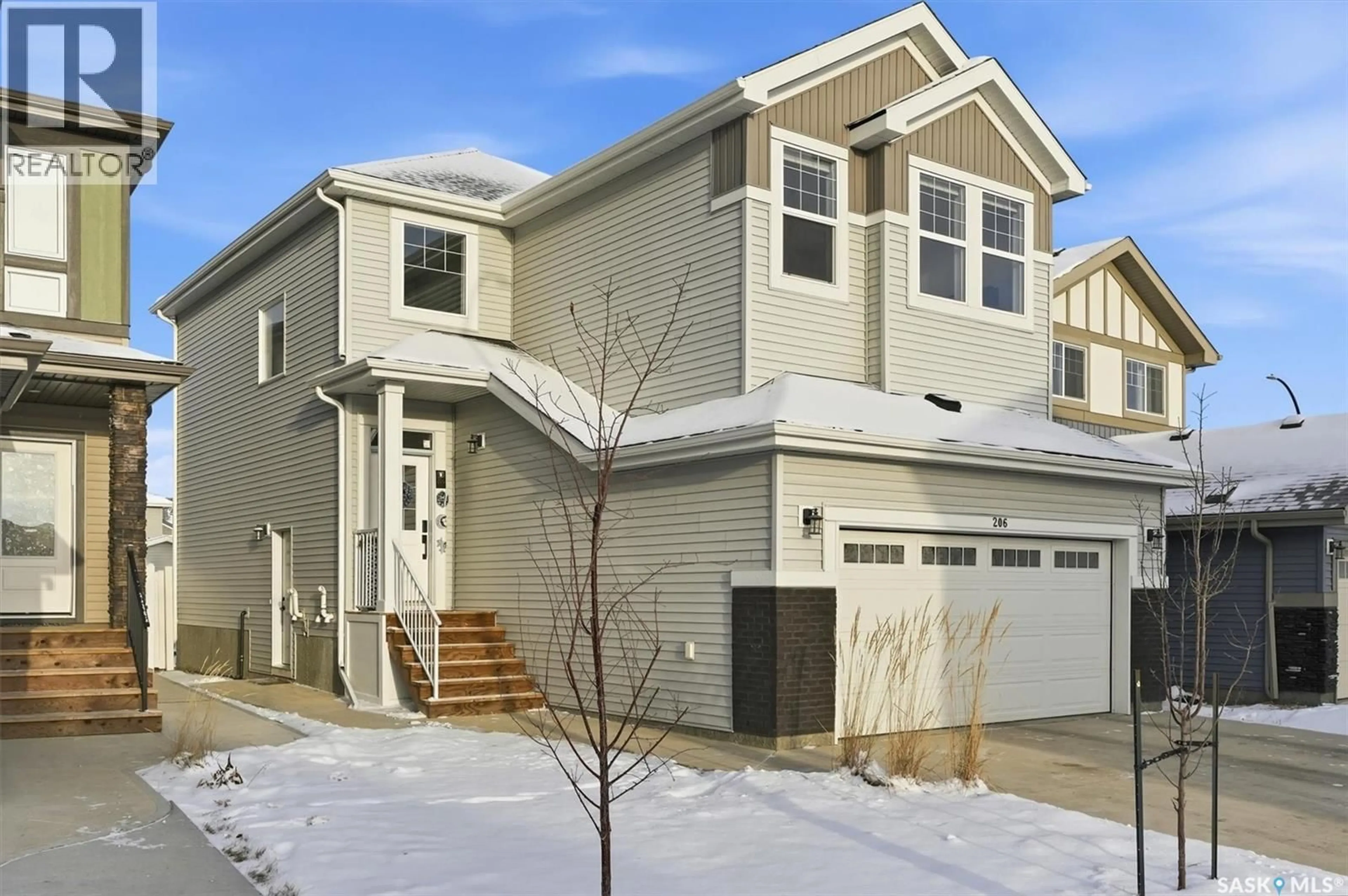 Home with vinyl exterior material, street for 206 PEPPER COURT, Saskatoon Saskatchewan S7V1S6