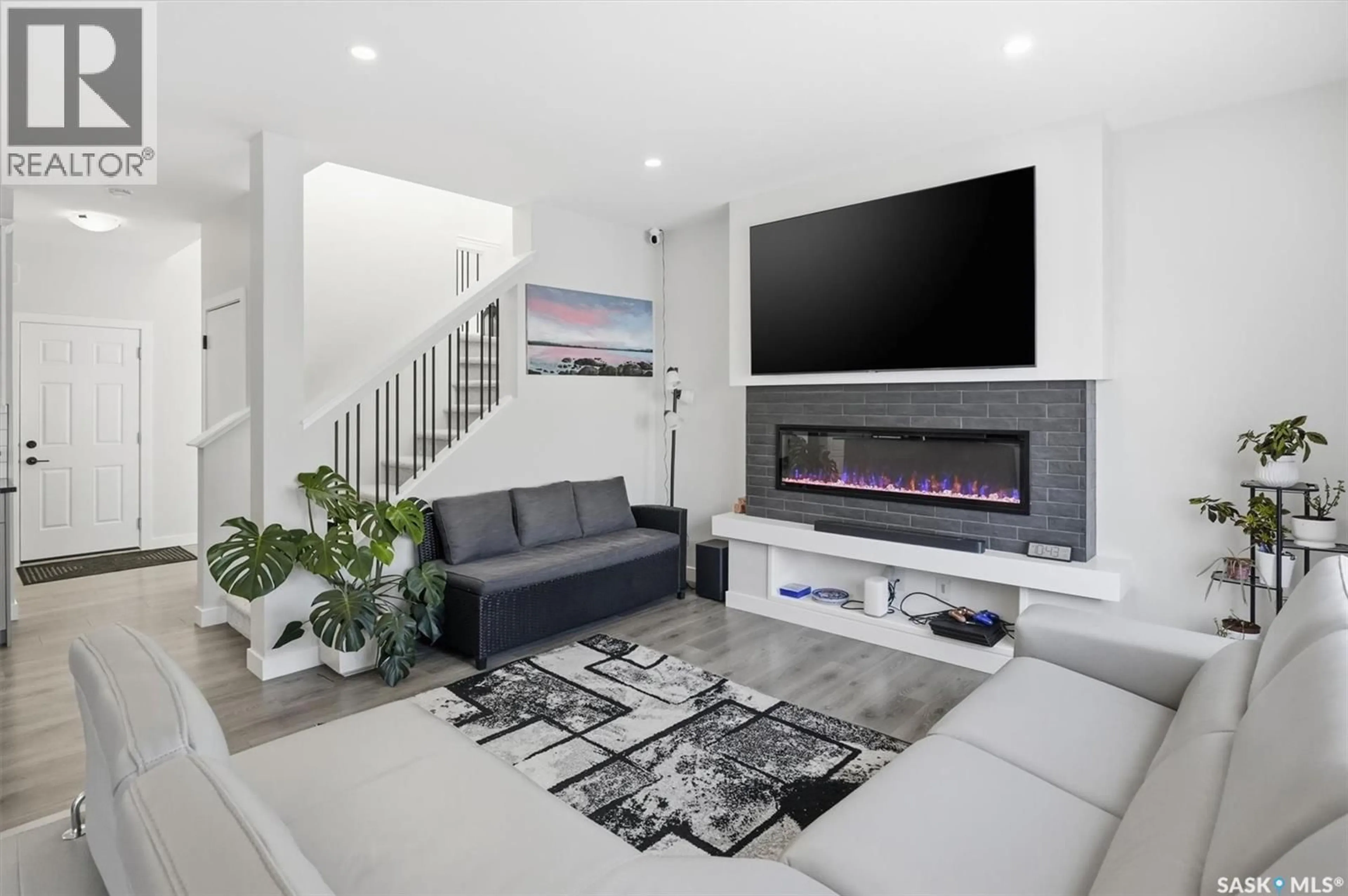 Living room with furniture, unknown for 206 PEPPER COURT, Saskatoon Saskatchewan S7V1S6