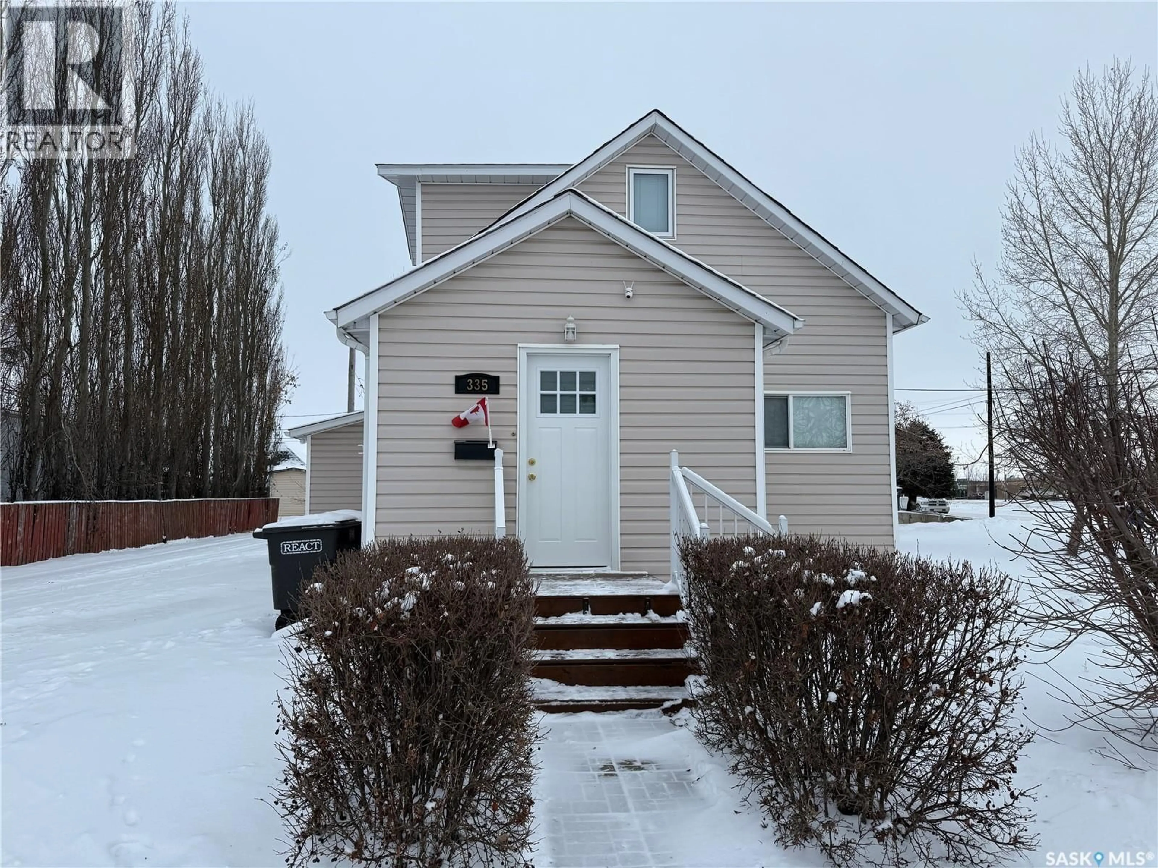 Home with vinyl exterior material, street for 335 6TH STREET, Humboldt Saskatchewan S0K2A0