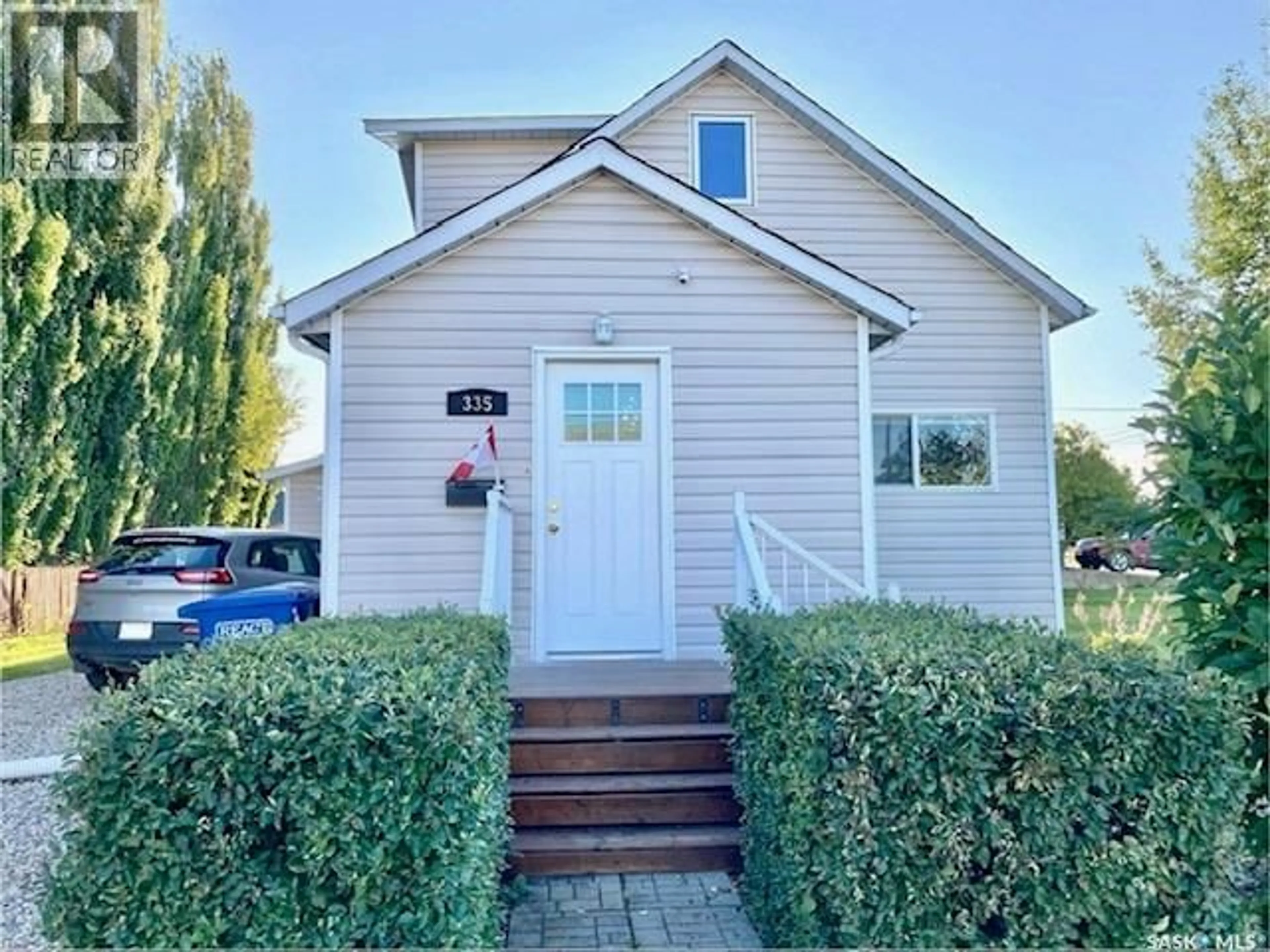 Home with vinyl exterior material, street for 335 6TH STREET, Humboldt Saskatchewan S0K2A0