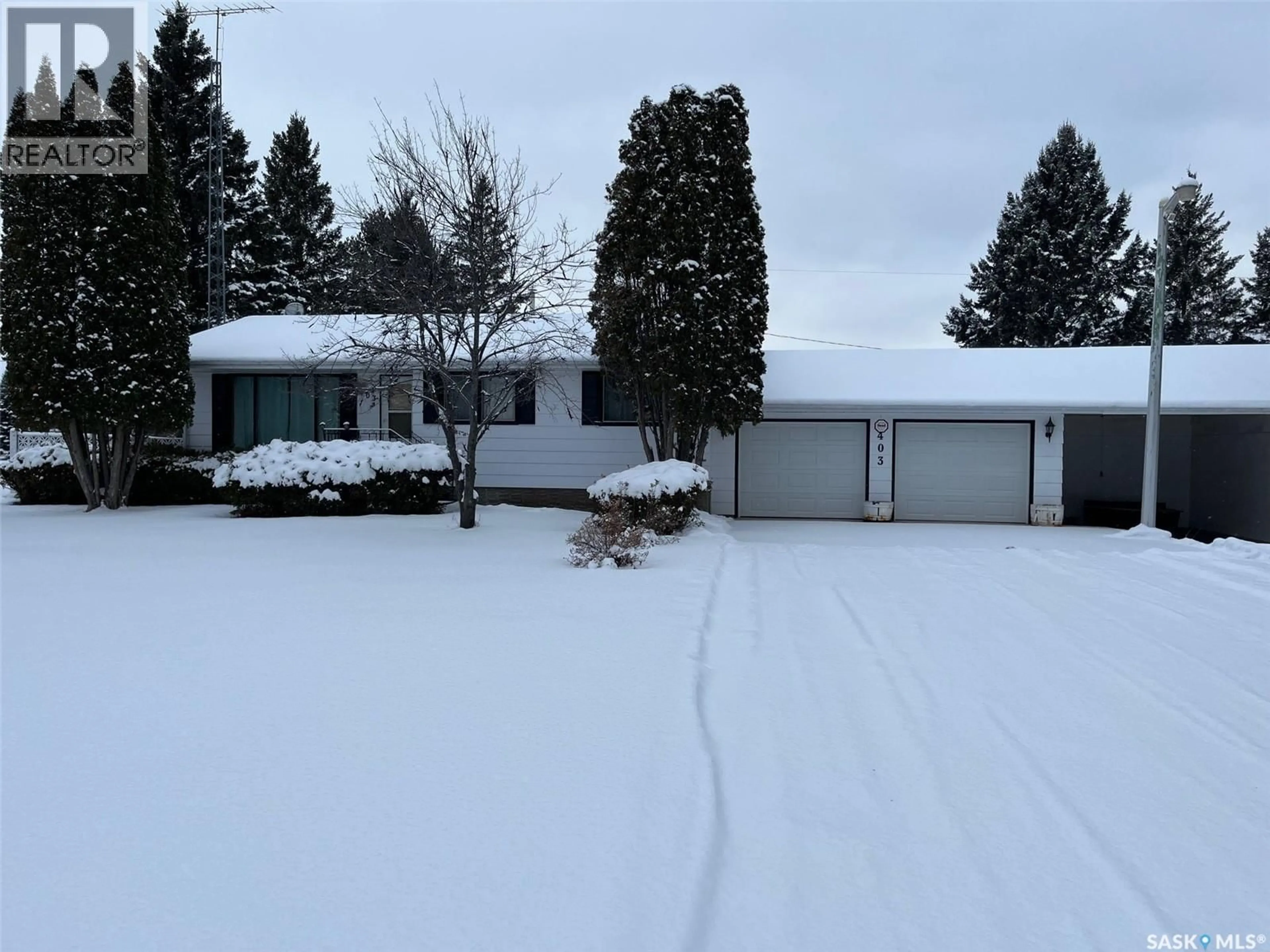 A pic from outside/outdoor area/front of a property/back of a property/a pic from drone, street for 403 CEDAR AVENUE, Buckland Rm No. 491 Saskatchewan S6V5R3