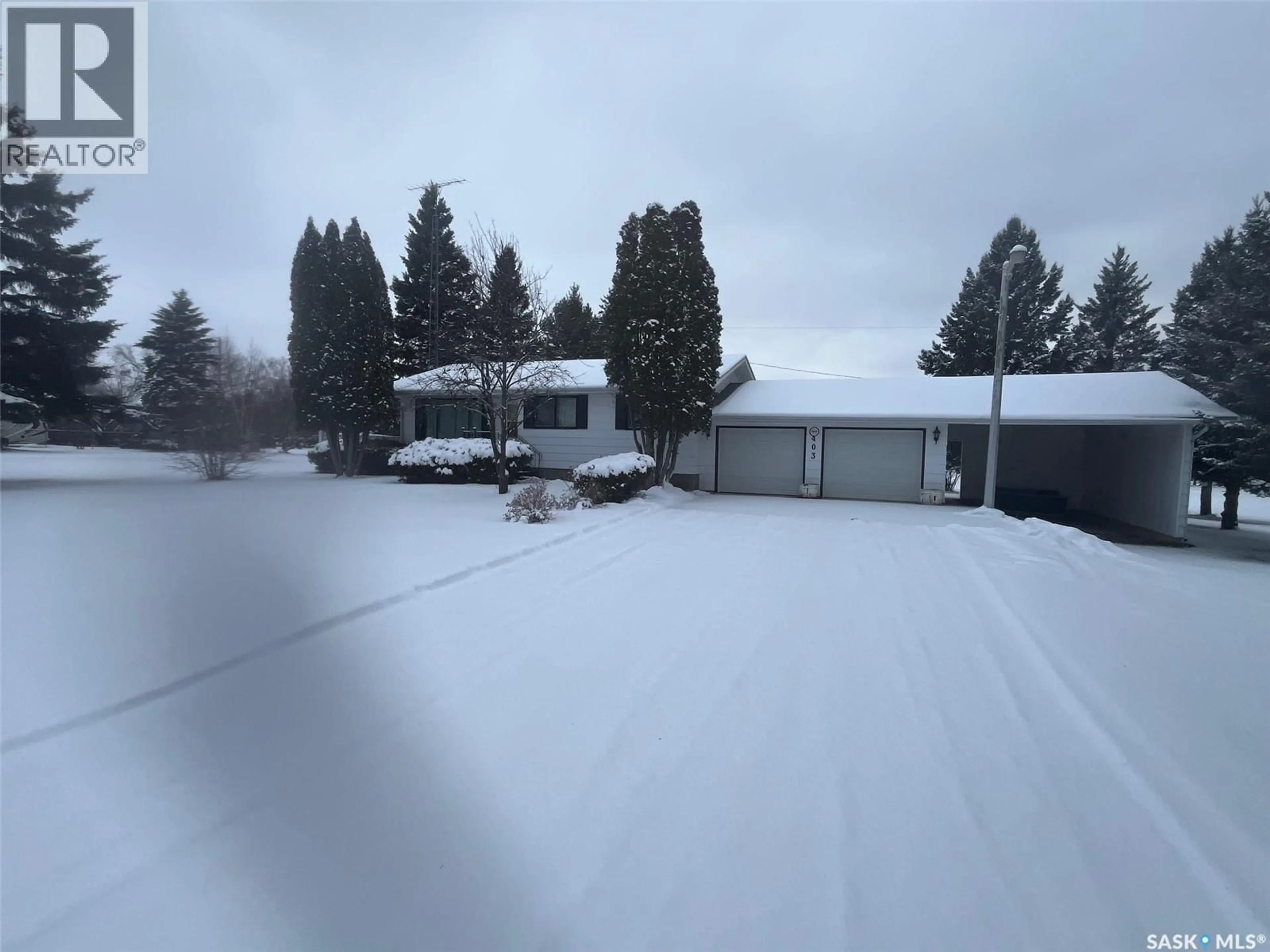 A pic from outside/outdoor area/front of a property/back of a property/a pic from drone, street for 403 CEDAR AVENUE, Buckland Rm No. 491 Saskatchewan S6V5R3