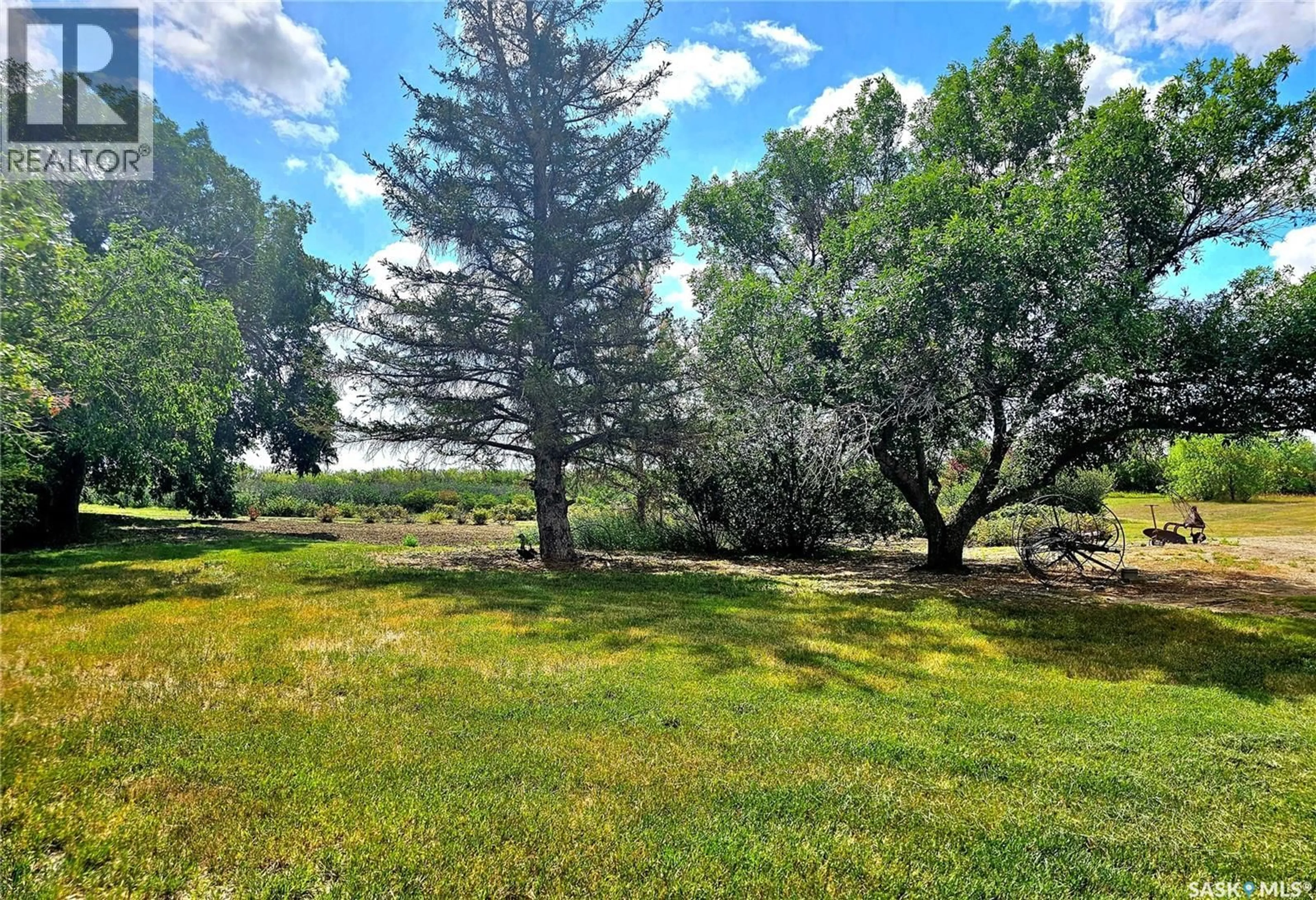 A pic from outside/outdoor area/front of a property/back of a property/a pic from drone, forest/trees view for MCLEOD ACREAGE, Miry Creek Rm No. 229 Saskatchewan S0N0A0