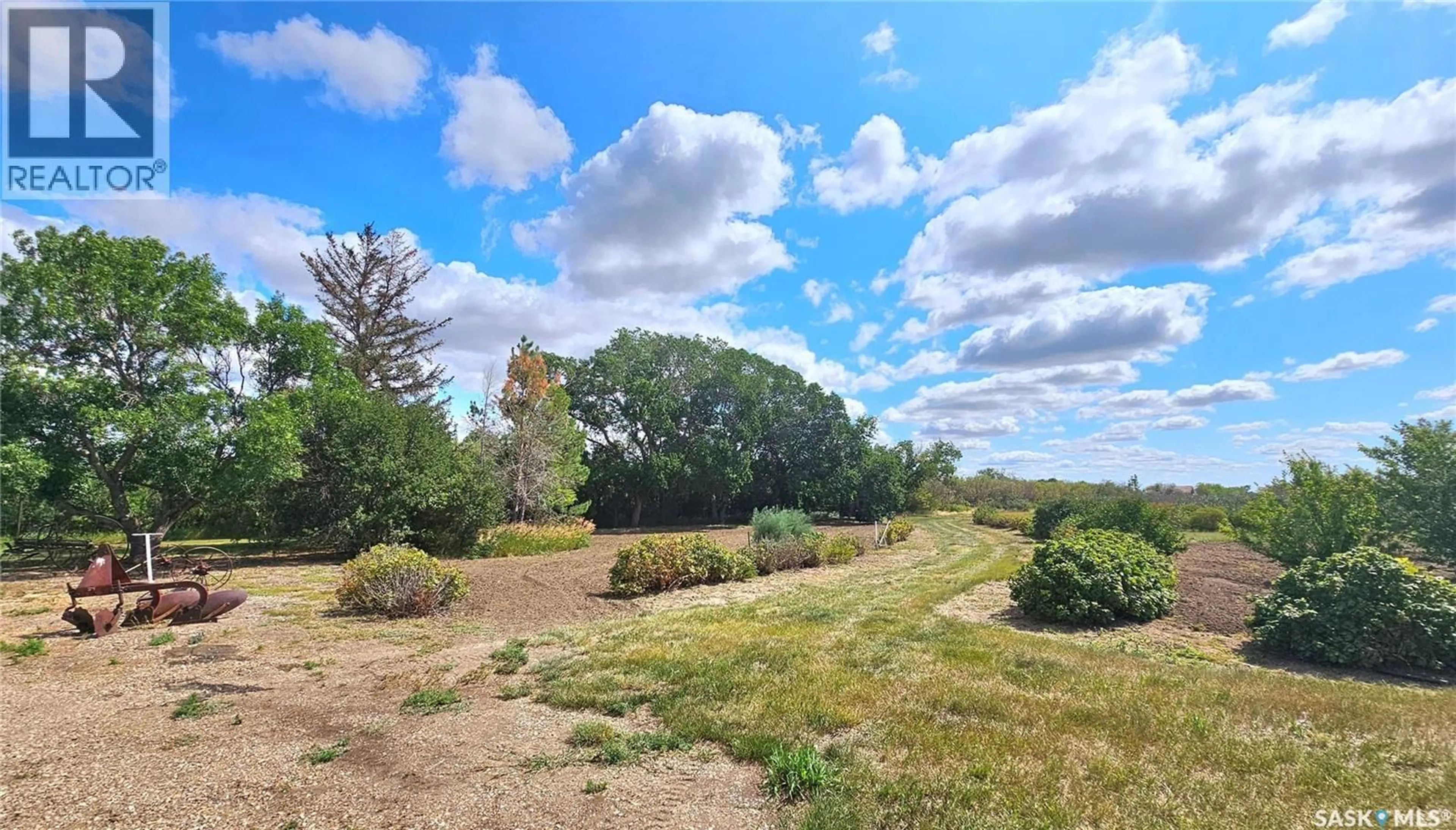 A pic from outside/outdoor area/front of a property/back of a property/a pic from drone, forest/trees view for MCLEOD ACREAGE, Miry Creek Rm No. 229 Saskatchewan S0N0A0