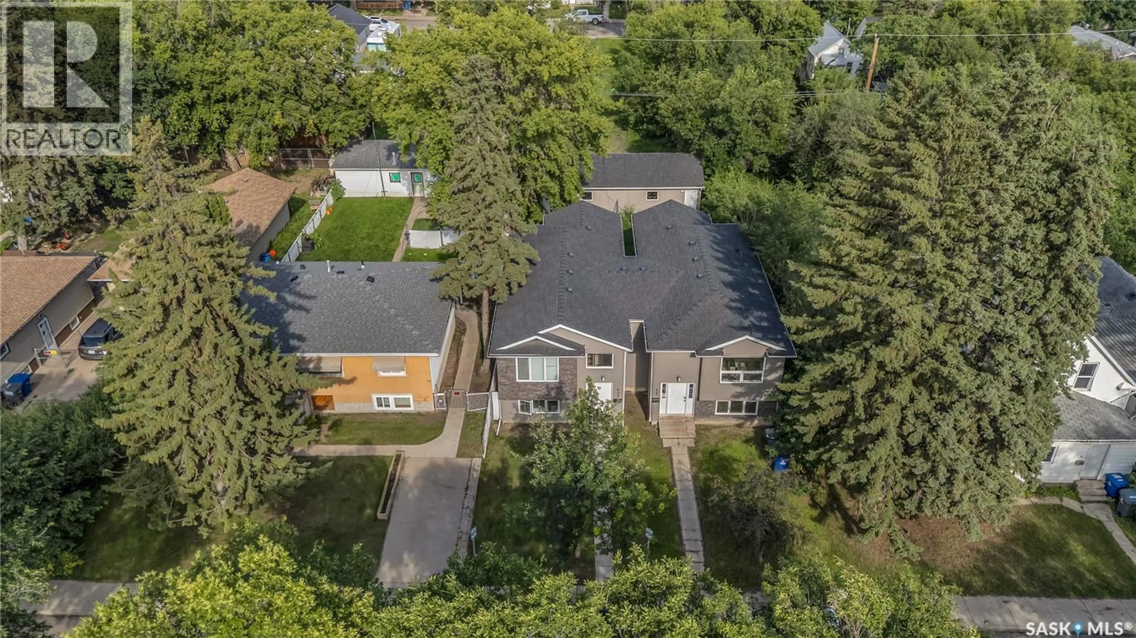 A pic from outside/outdoor area/front of a property/back of a property/a pic from drone, street for 432 S AVENUE S, Saskatoon Saskatchewan S7M3A4