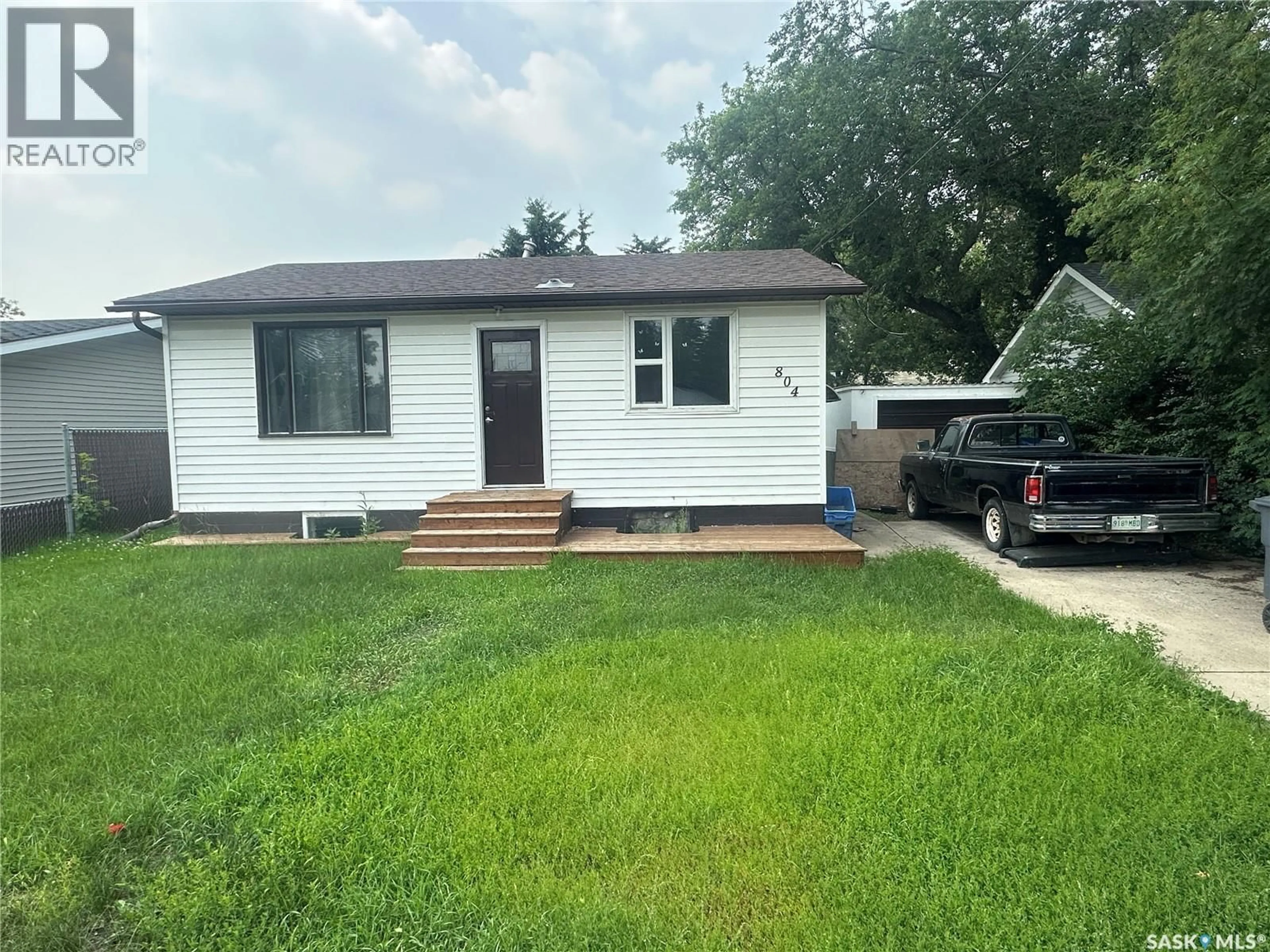 Home with vinyl exterior material, street for 804 5TH AVENUE, Rosthern Saskatchewan S0K3R0