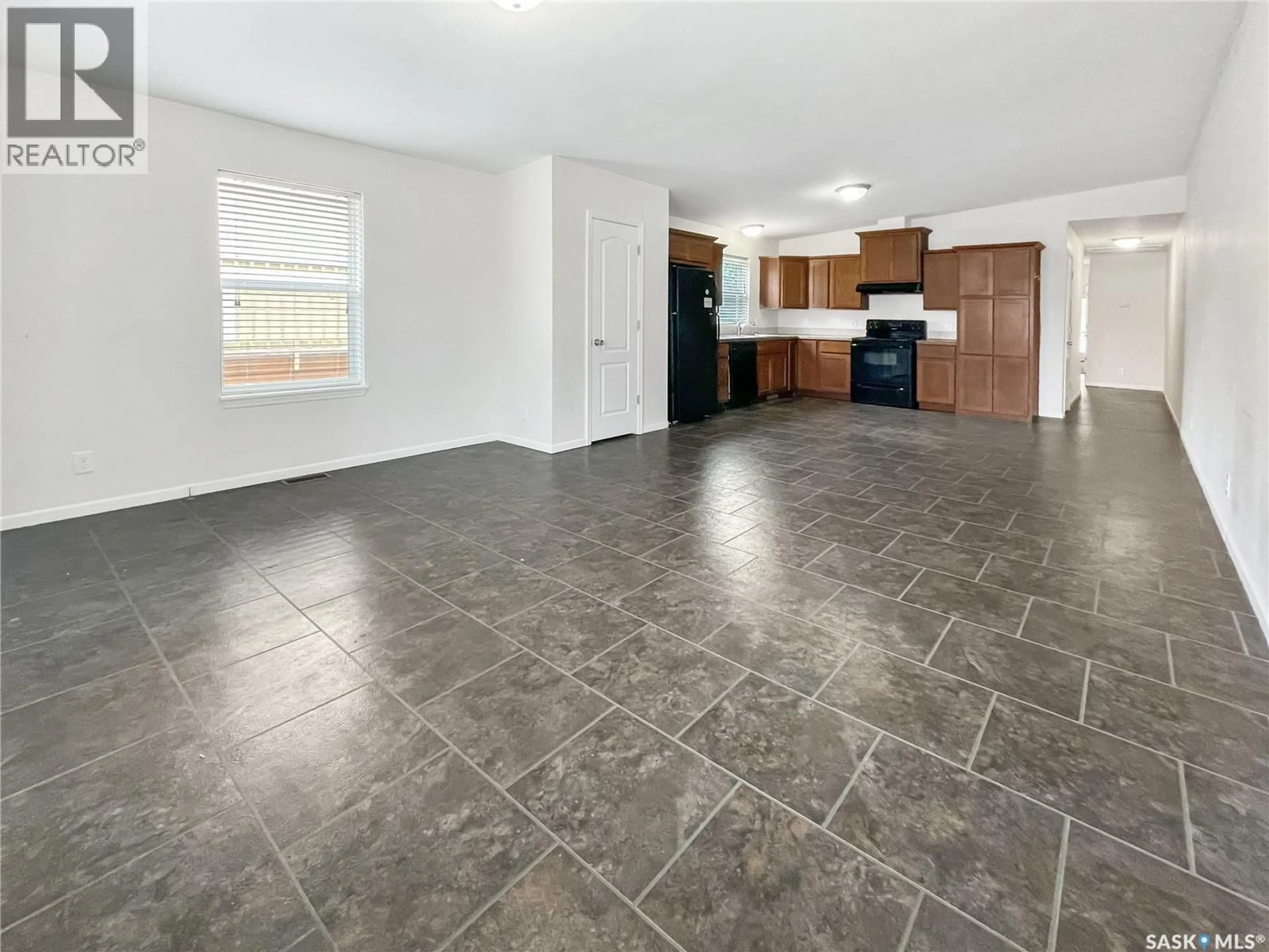 Open concept kitchen, ceramic/tile floor for B - 8470 HOWARD AVENUE, Gull Lake Saskatchewan S0N1A0