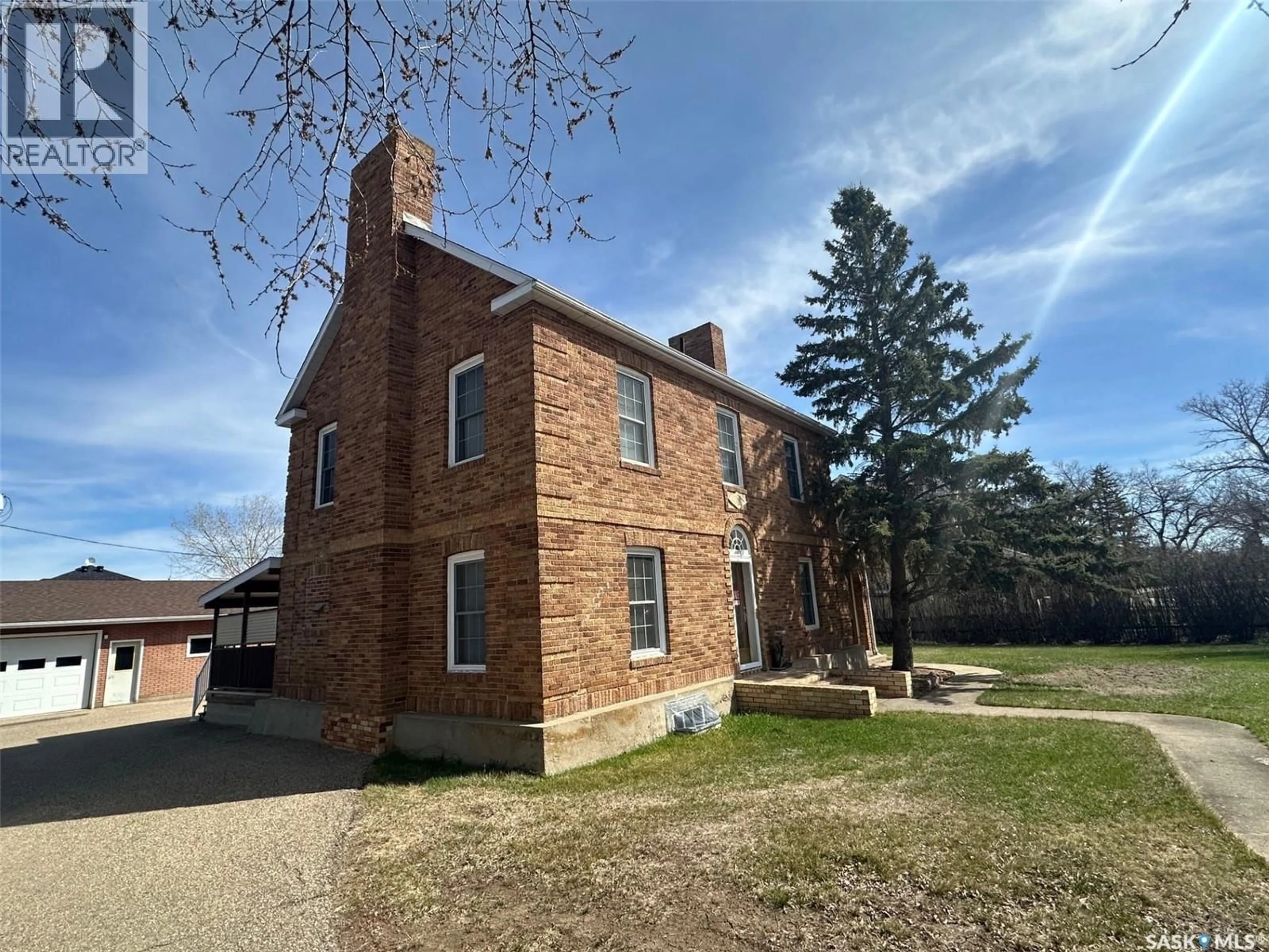 A pic from outside/outdoor area/front of a property/back of a property/a pic from drone, building for 107 1ST AVENUE, Gravelbourg Saskatchewan S0H1X0