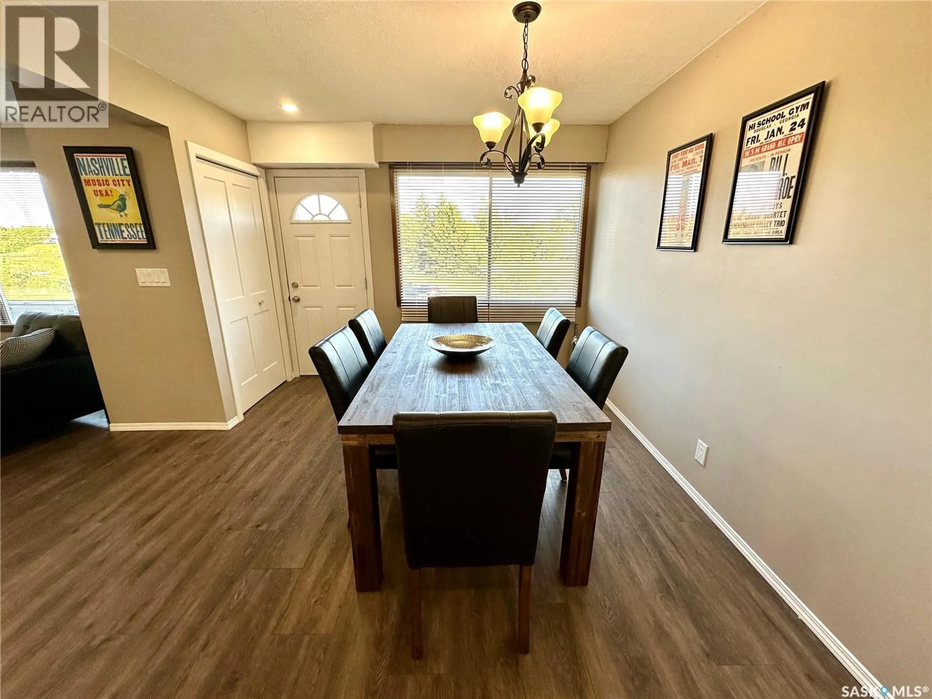 Dining room, wood/laminate floor for 510 BRAY STREET, Swift Current Saskatchewan S9H4E3