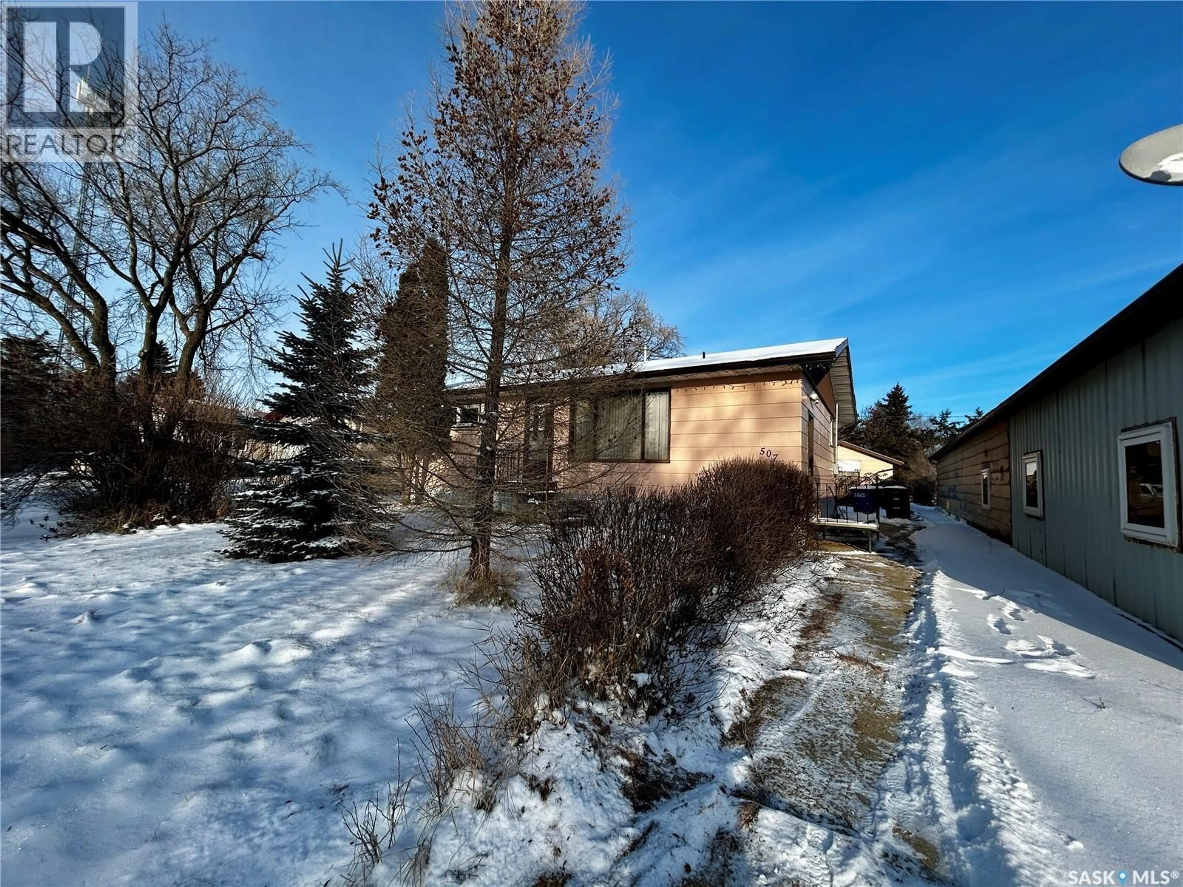 A pic from outside/outdoor area/front of a property/back of a property/a pic from drone, street for 507 DOEPKER AVENUE, Annaheim Saskatchewan S0K0G0