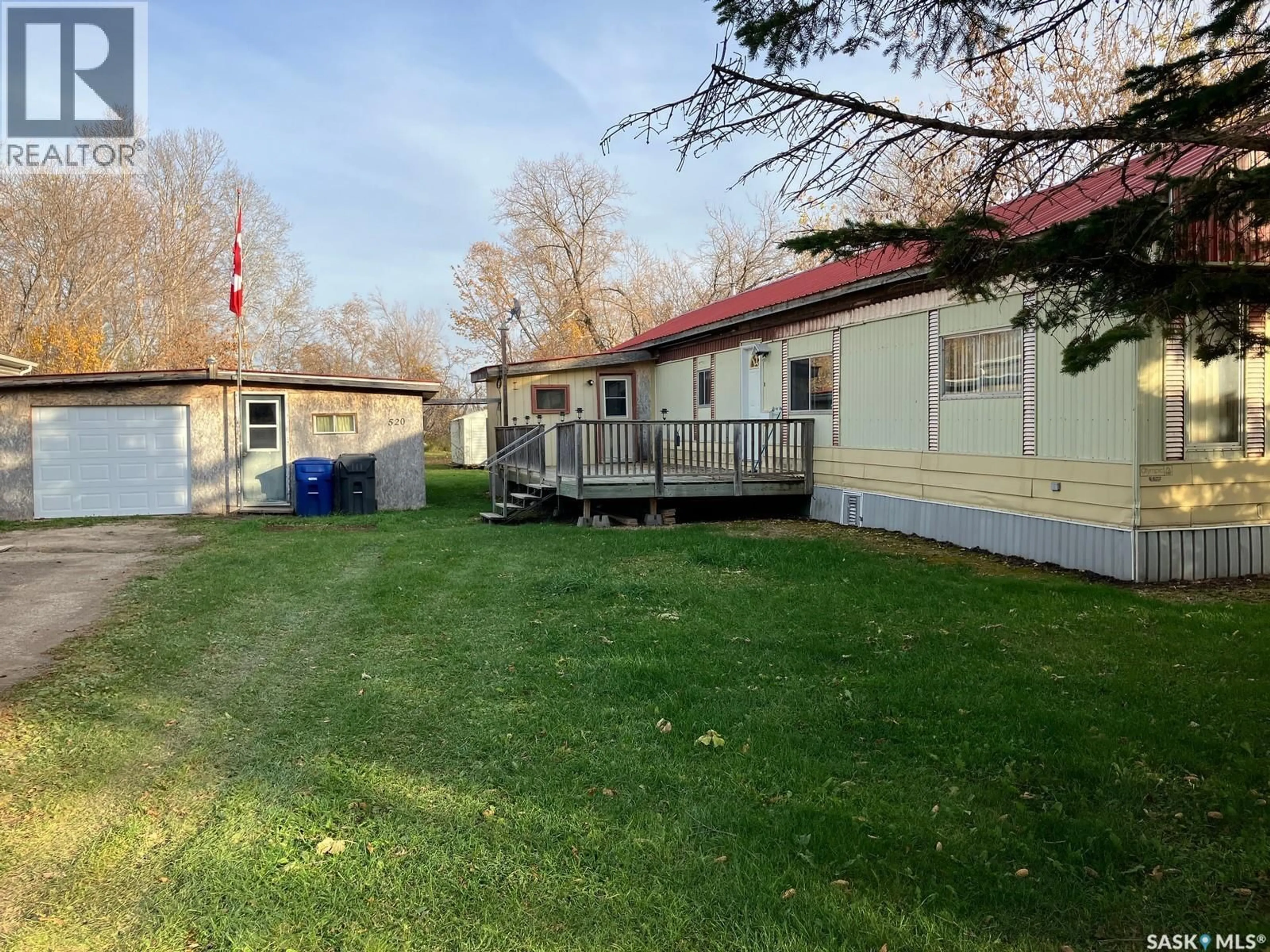 A pic from outside/outdoor area/front of a property/back of a property/a pic from drone, street for 520 PARKDALE STREET, Carrot River Saskatchewan S0E0L0