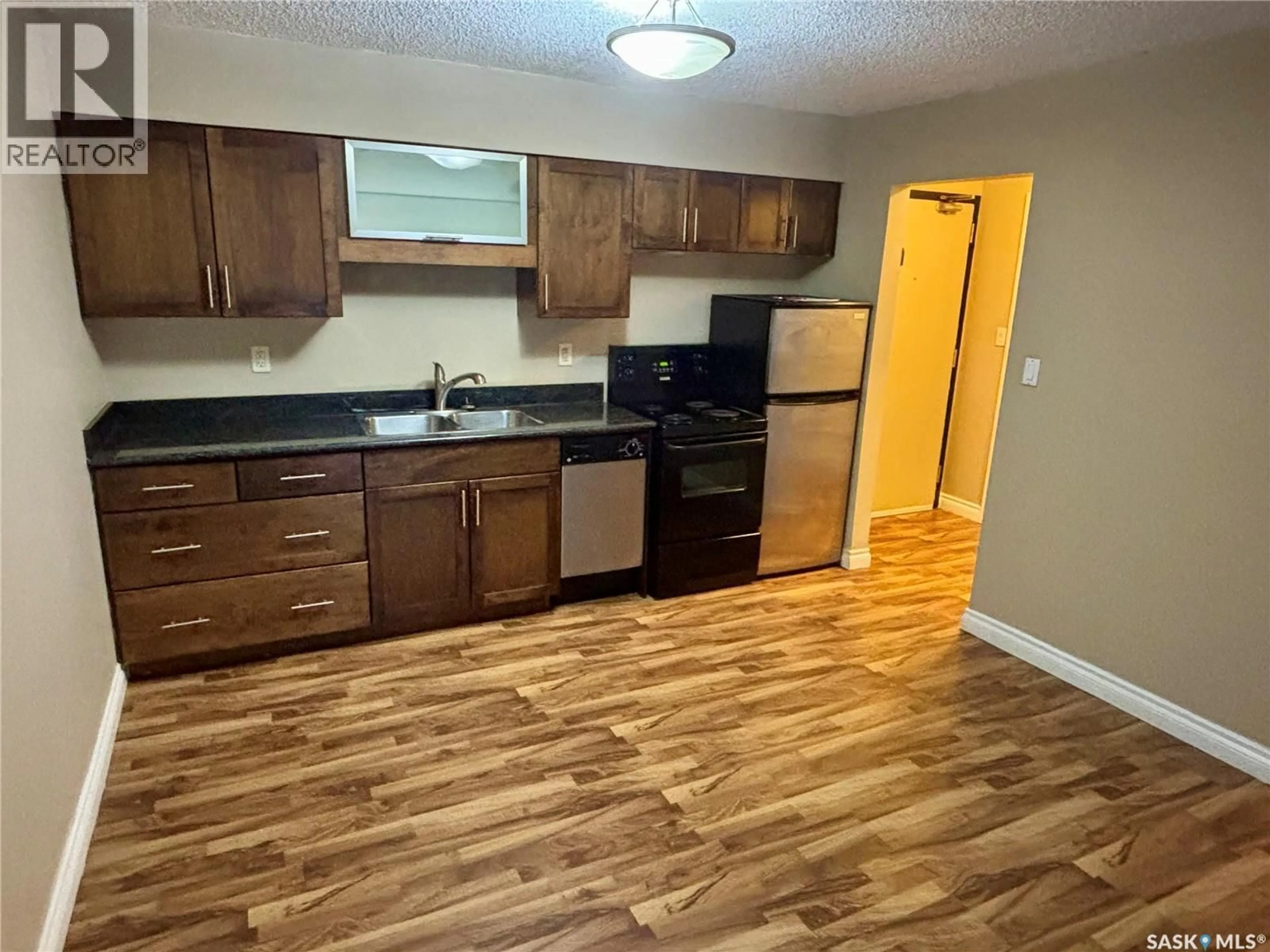 Standard kitchen, wood/laminate floor for 104 - 10 104TH STREET, Saskatoon Saskatchewan S7N1M8