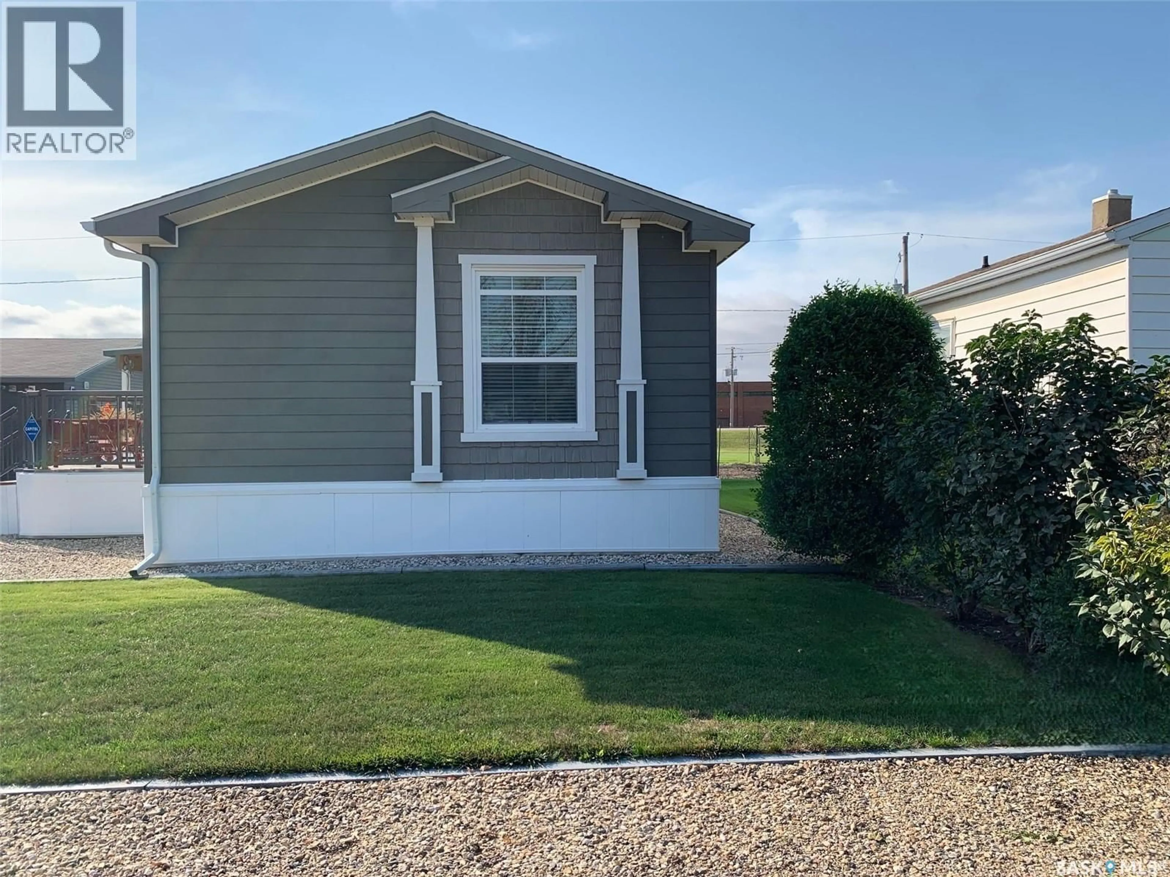Home with vinyl exterior material, street for 115 PATRICIA STREET, Hudson Bay Saskatchewan S0E0Y0