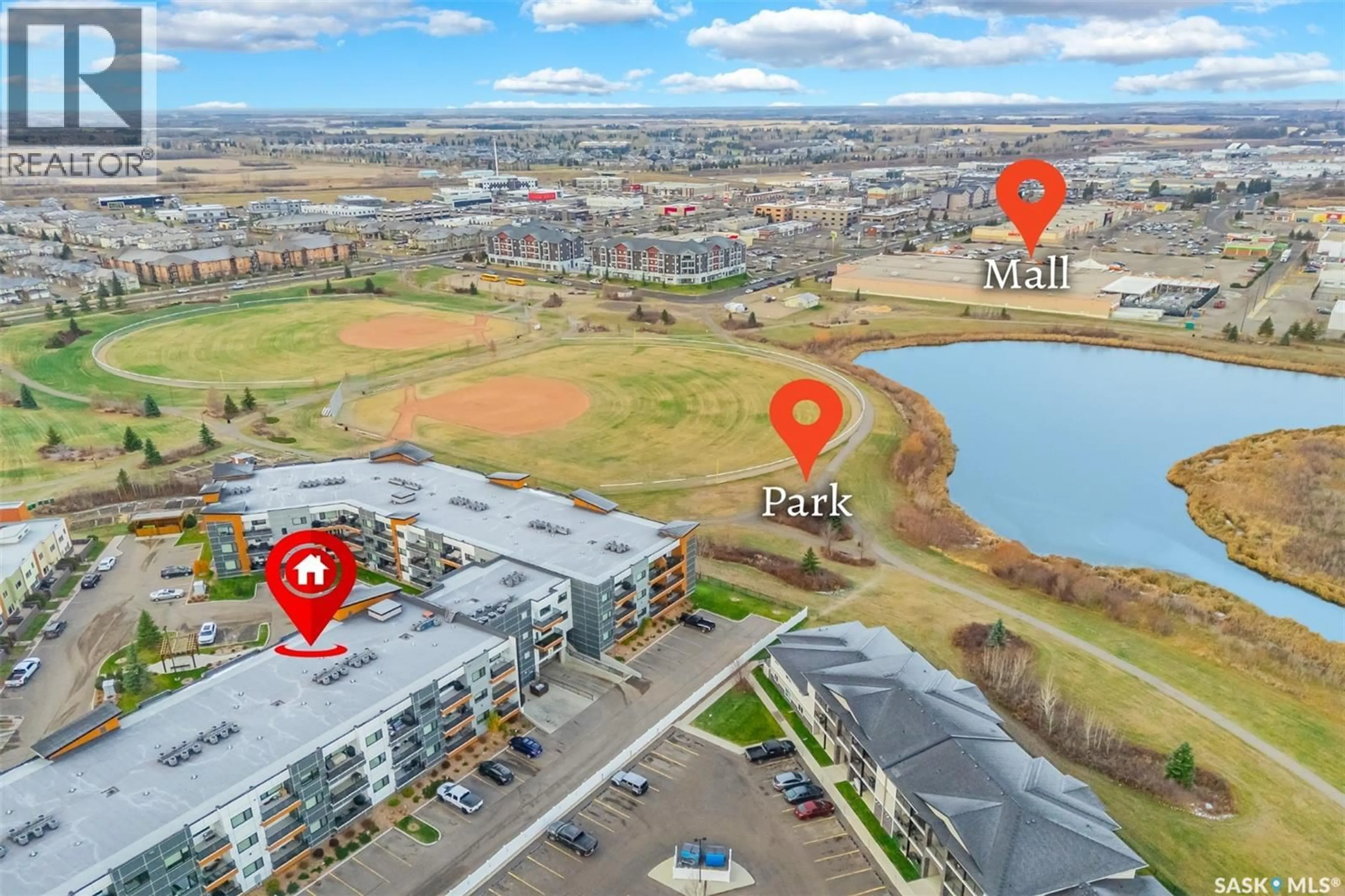 A pic from outside/outdoor area/front of a property/back of a property/a pic from drone, water/lake/river/ocean view for 105 - 212 WILLIS CRESCENT, Saskatoon Saskatchewan S7T0Z3