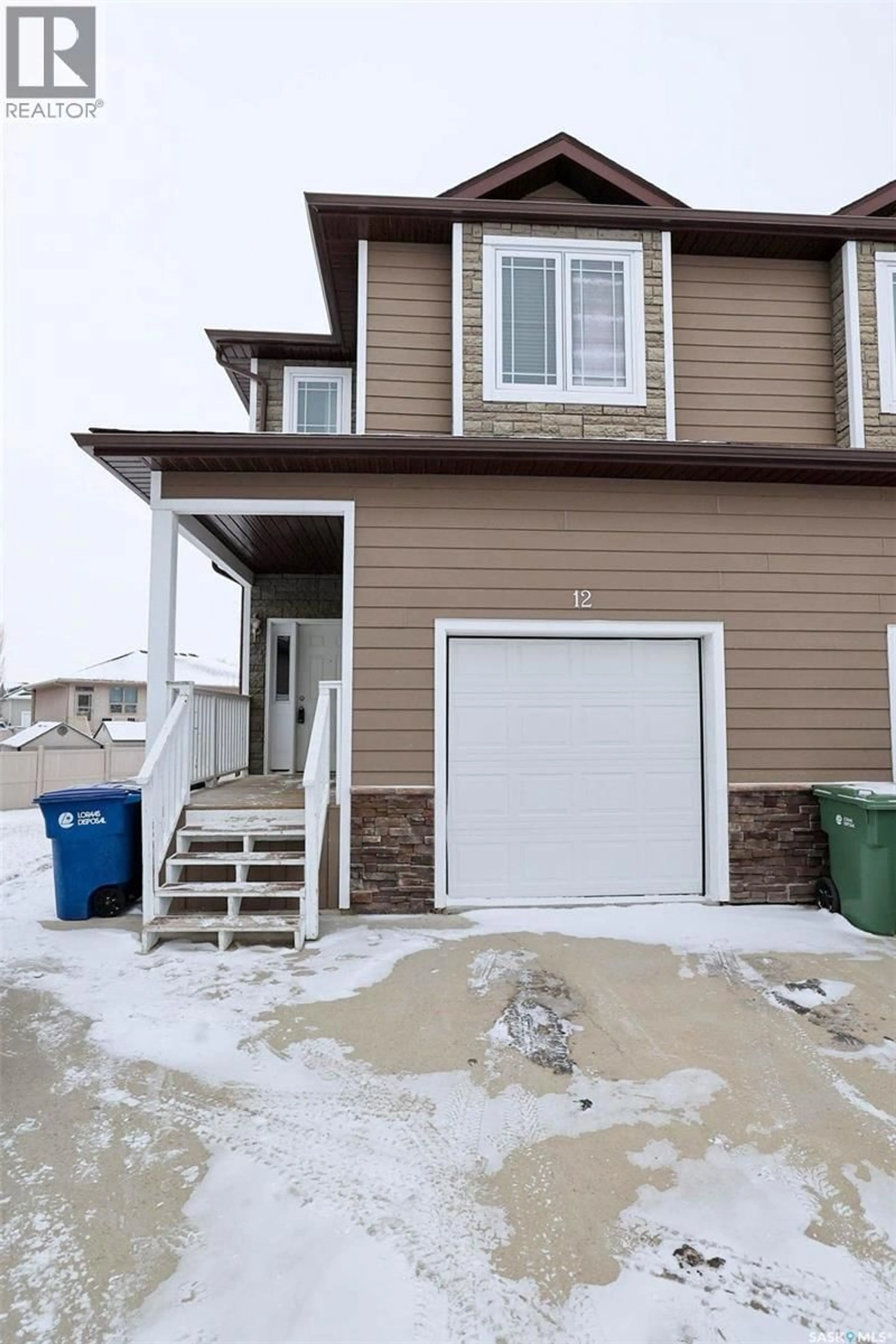 Home with vinyl exterior material, street for 12 MCKENZIE LANE, White City Saskatchewan S4L0B2