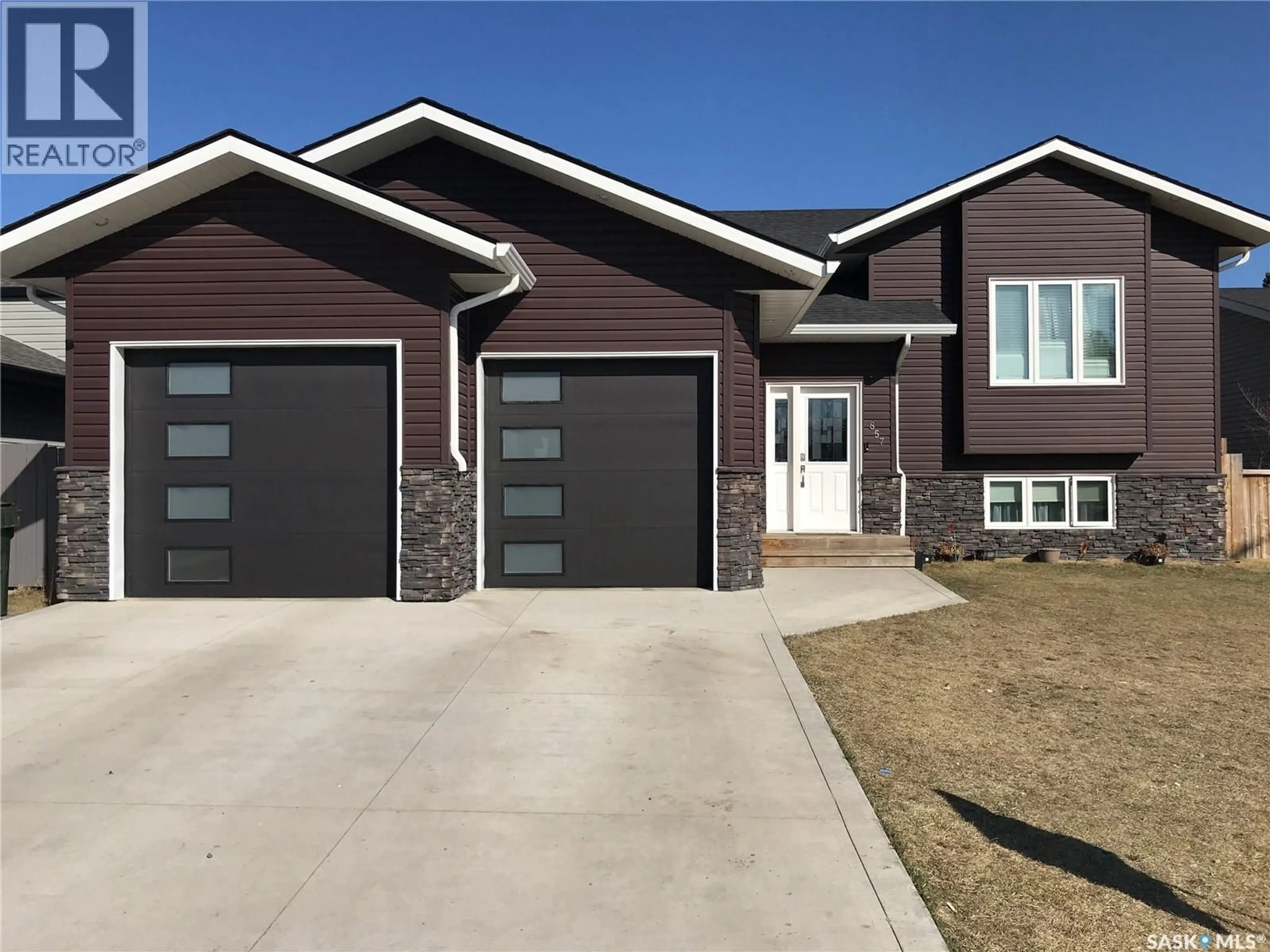 Home with brick exterior material, street for 857 MADSEN PLACE, Prince Albert Saskatchewan S6V2L6