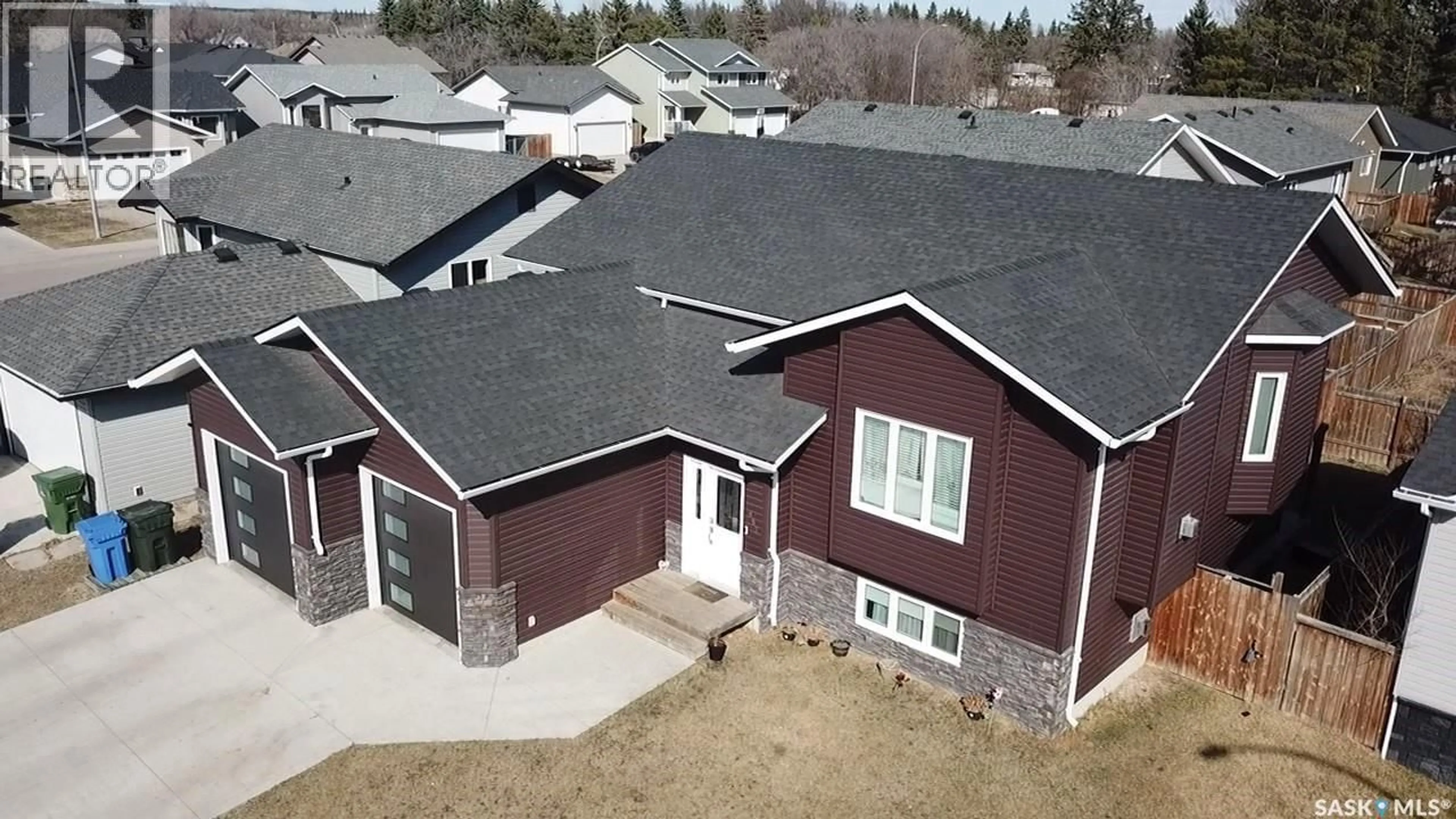 A pic from outside/outdoor area/front of a property/back of a property/a pic from drone, street for 857 MADSEN PLACE, Prince Albert Saskatchewan S6V2L6