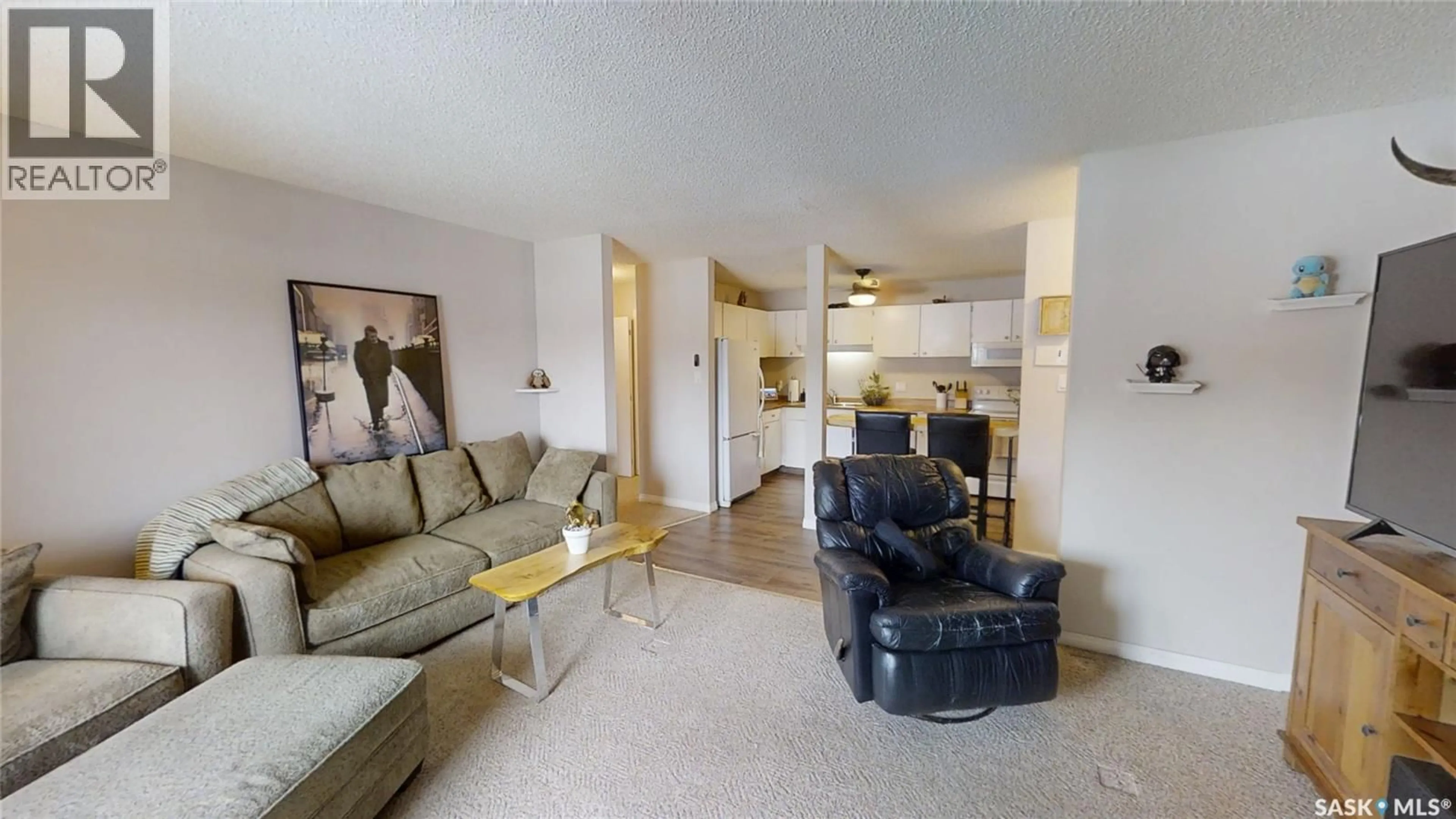 Living room with furniture, unknown for 245 - 201 KINGSMERE BOULEVARD, Saskatoon Saskatchewan S7J4J6