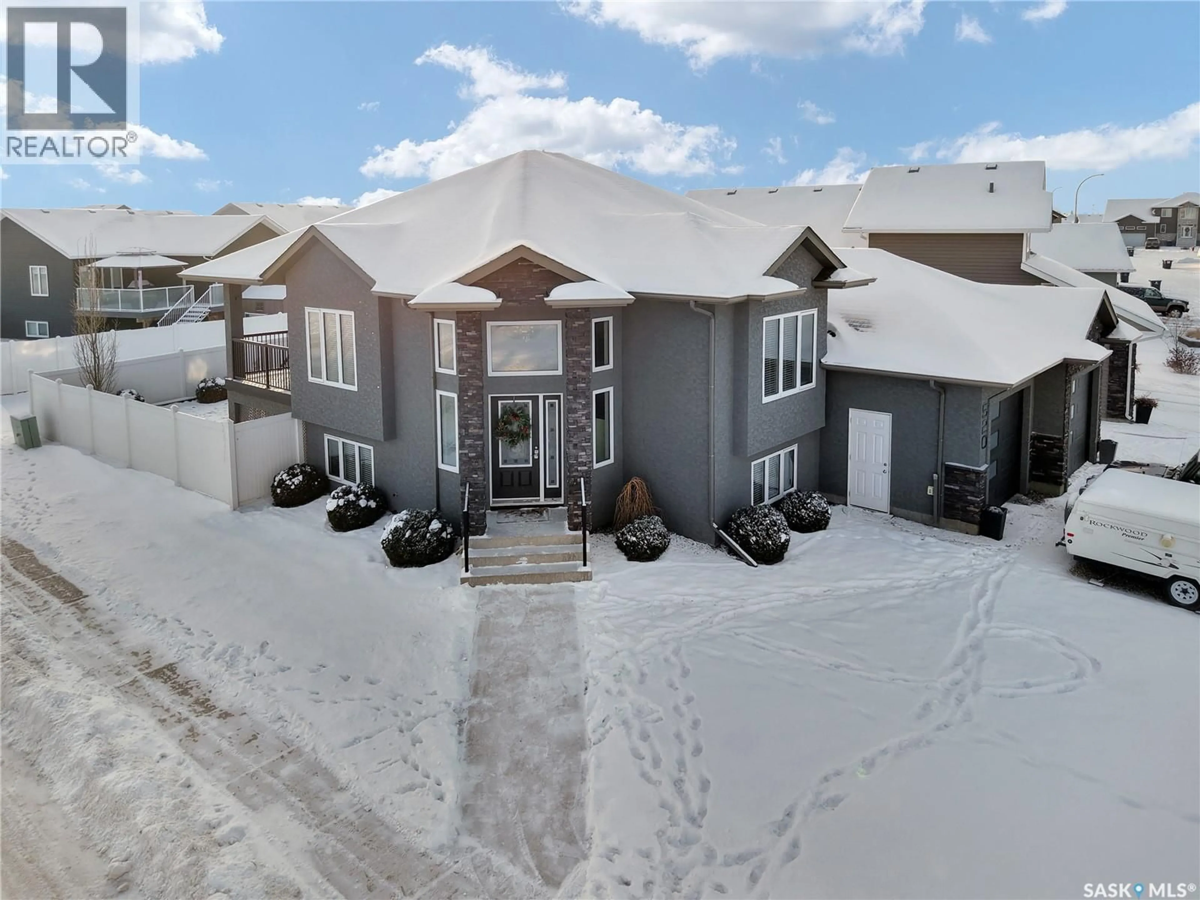 A pic from outside/outdoor area/front of a property/back of a property/a pic from drone, street for 520 COUPLES COURT, Warman Saskatchewan S0K4S1