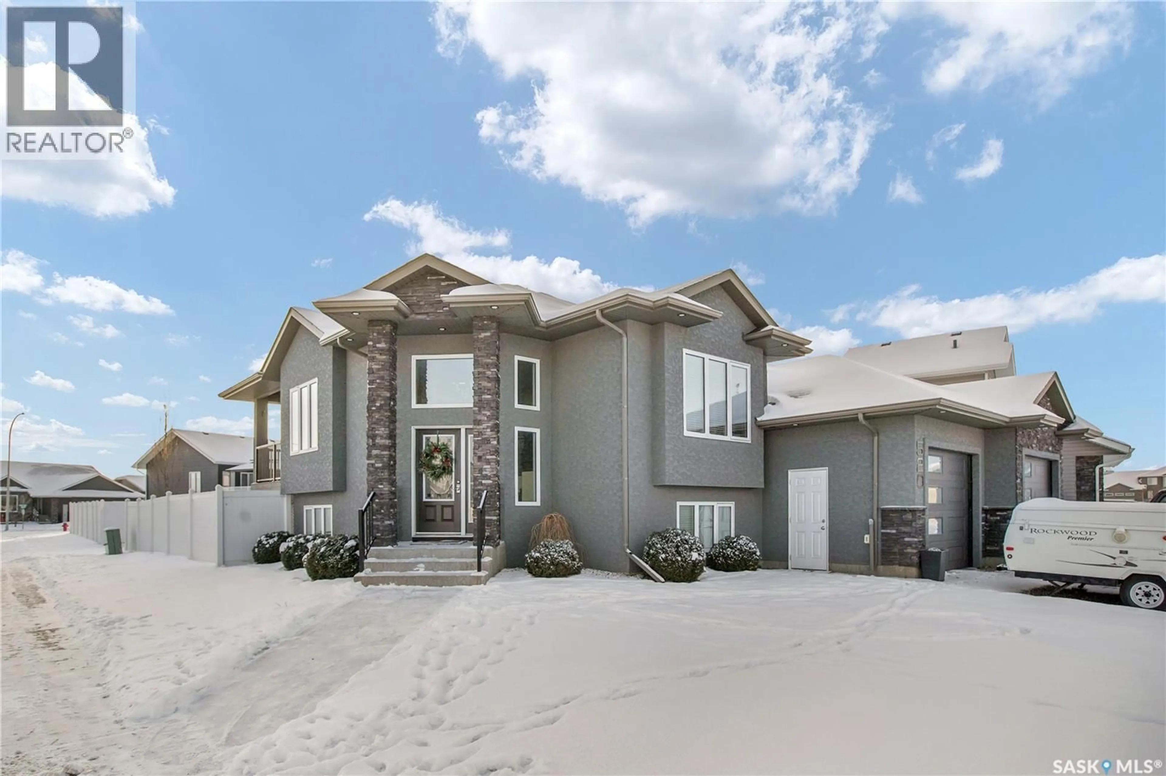 Home with brick exterior material, street for 520 COUPLES COURT, Warman Saskatchewan S0K4S1